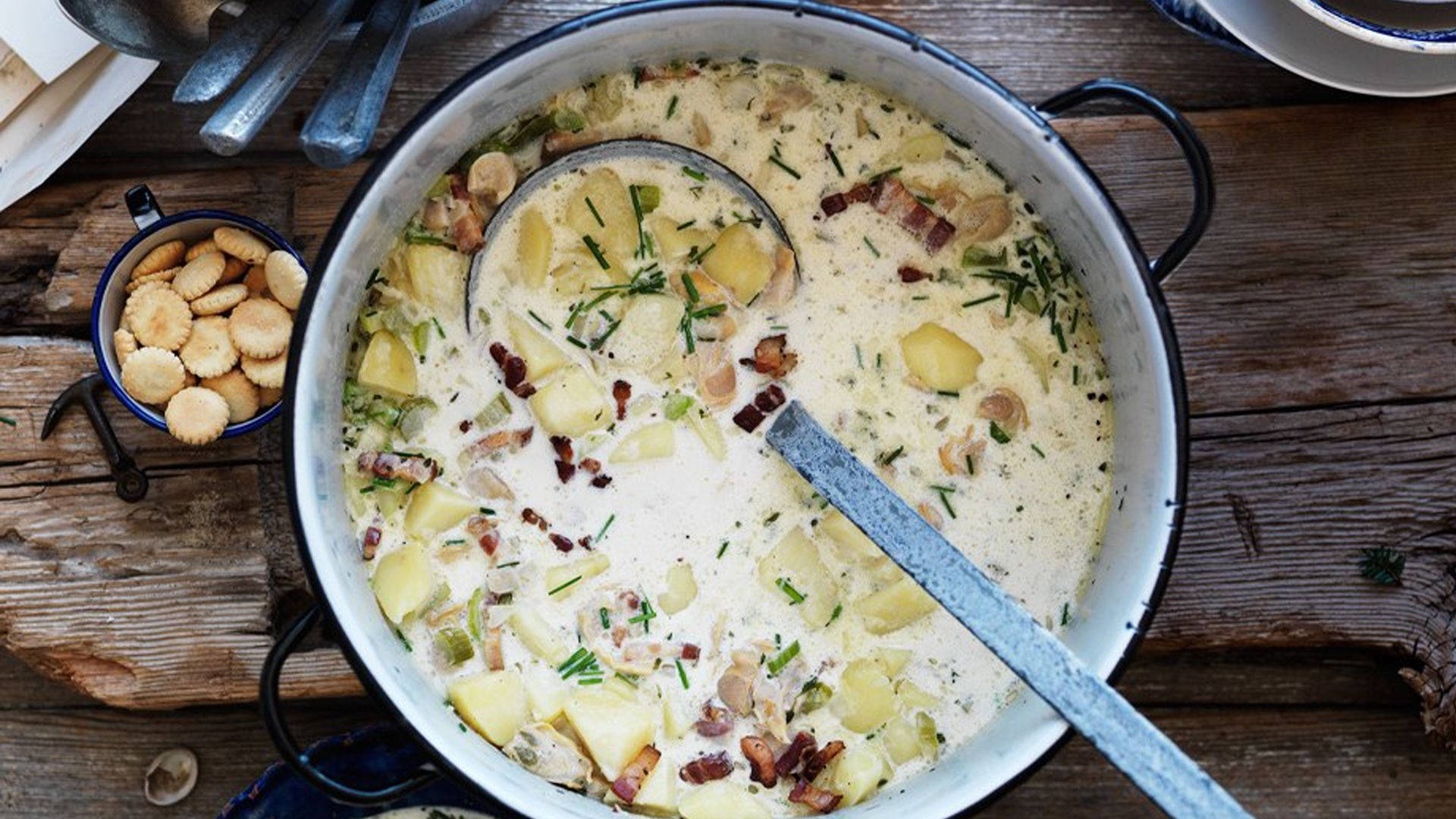 New England Clam Chowder Soup In A Pot Background