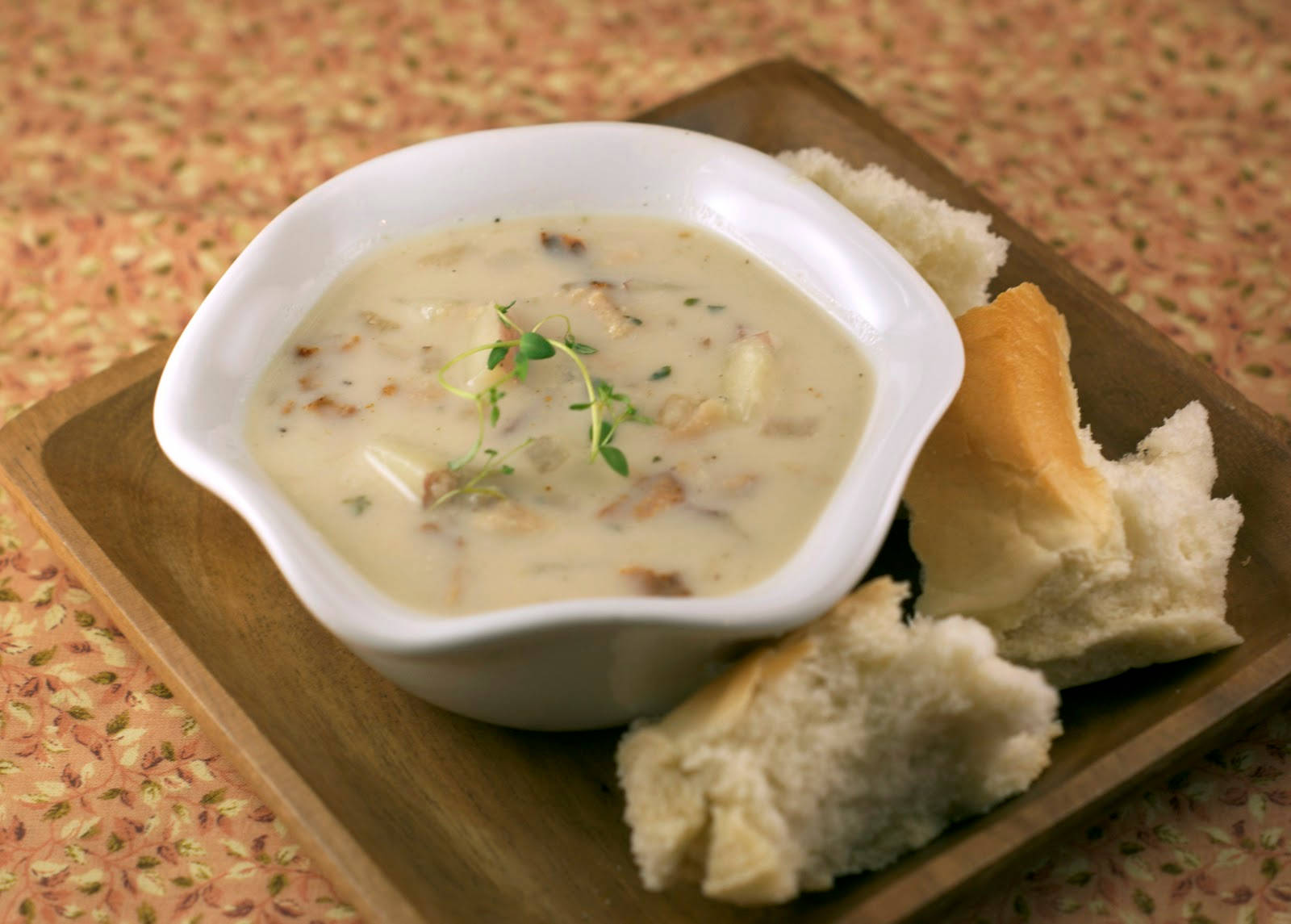 New England Clam Chowder Soup With Bread Background