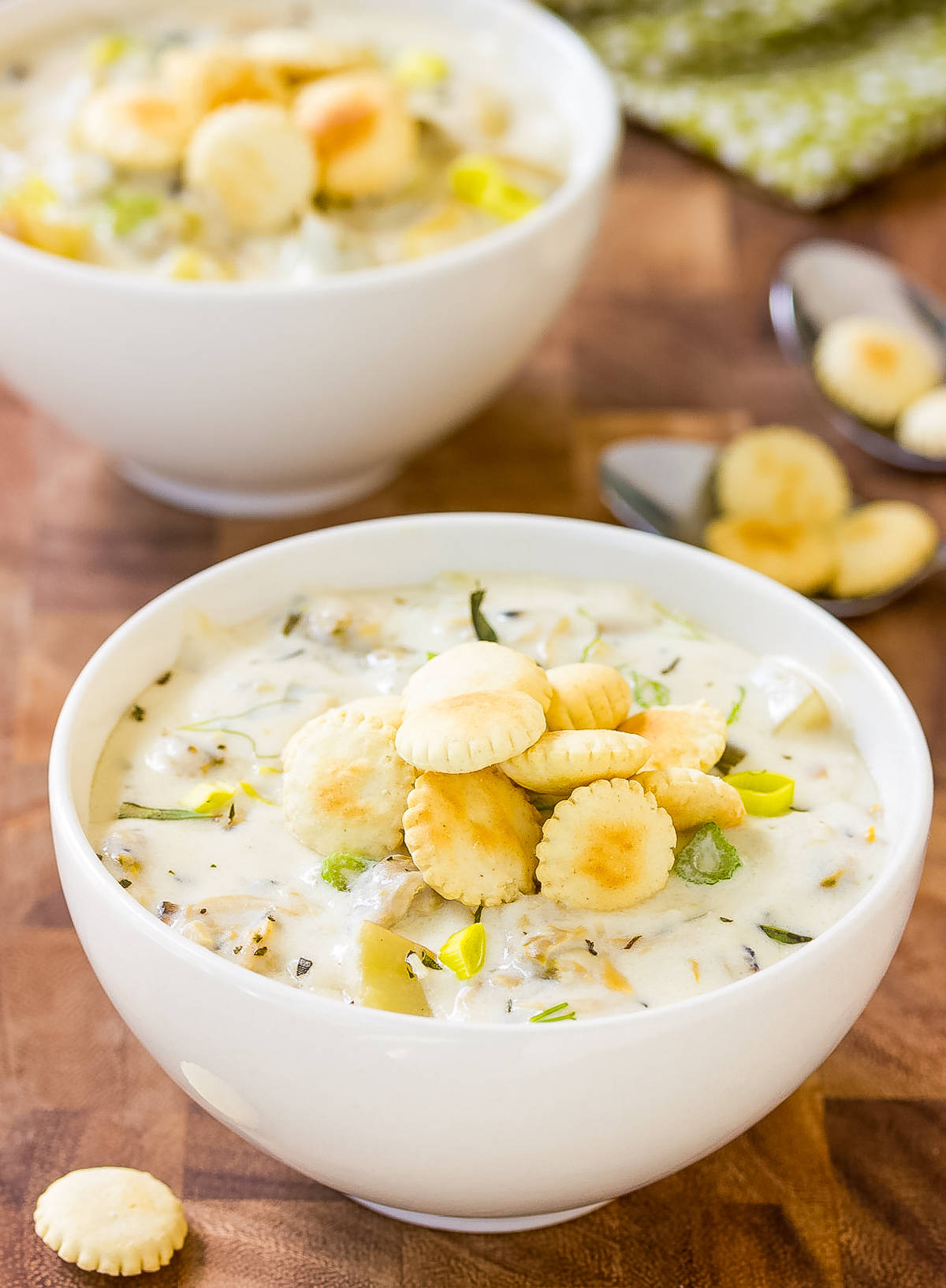 New England Clam Chowder Topped With Saltine Crackers Background