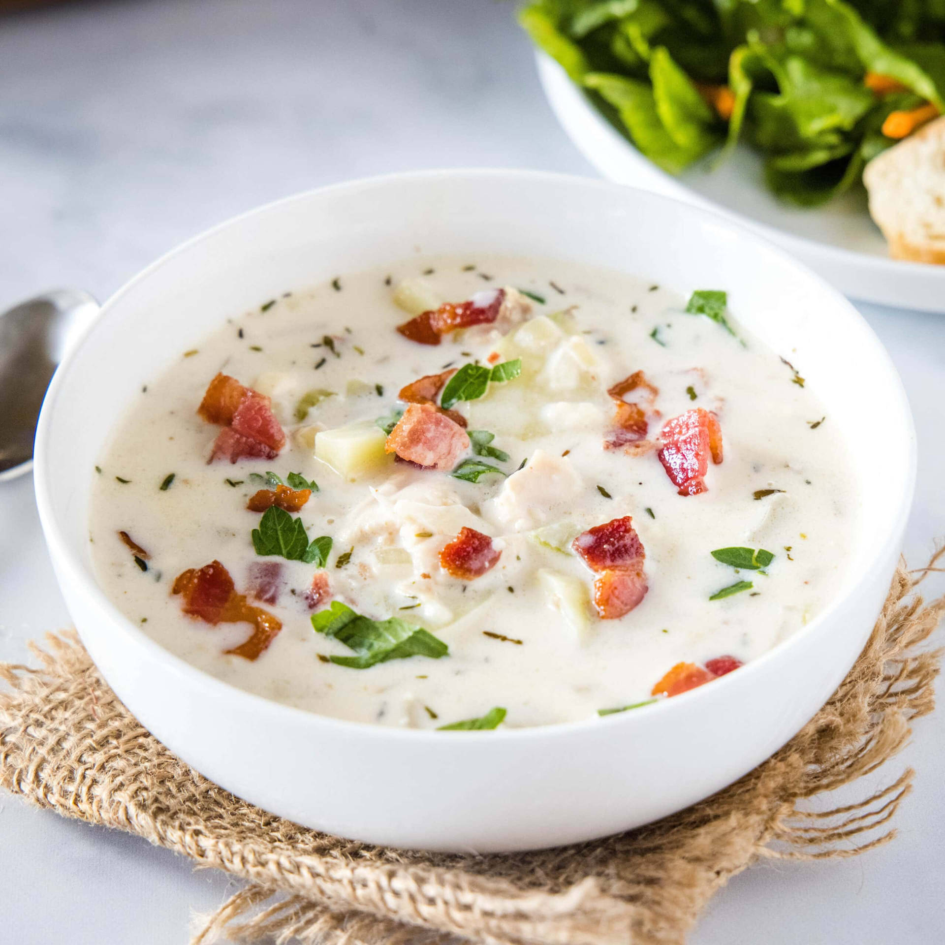 New England Style Clam Chowder Rich With Herbs And Bacon