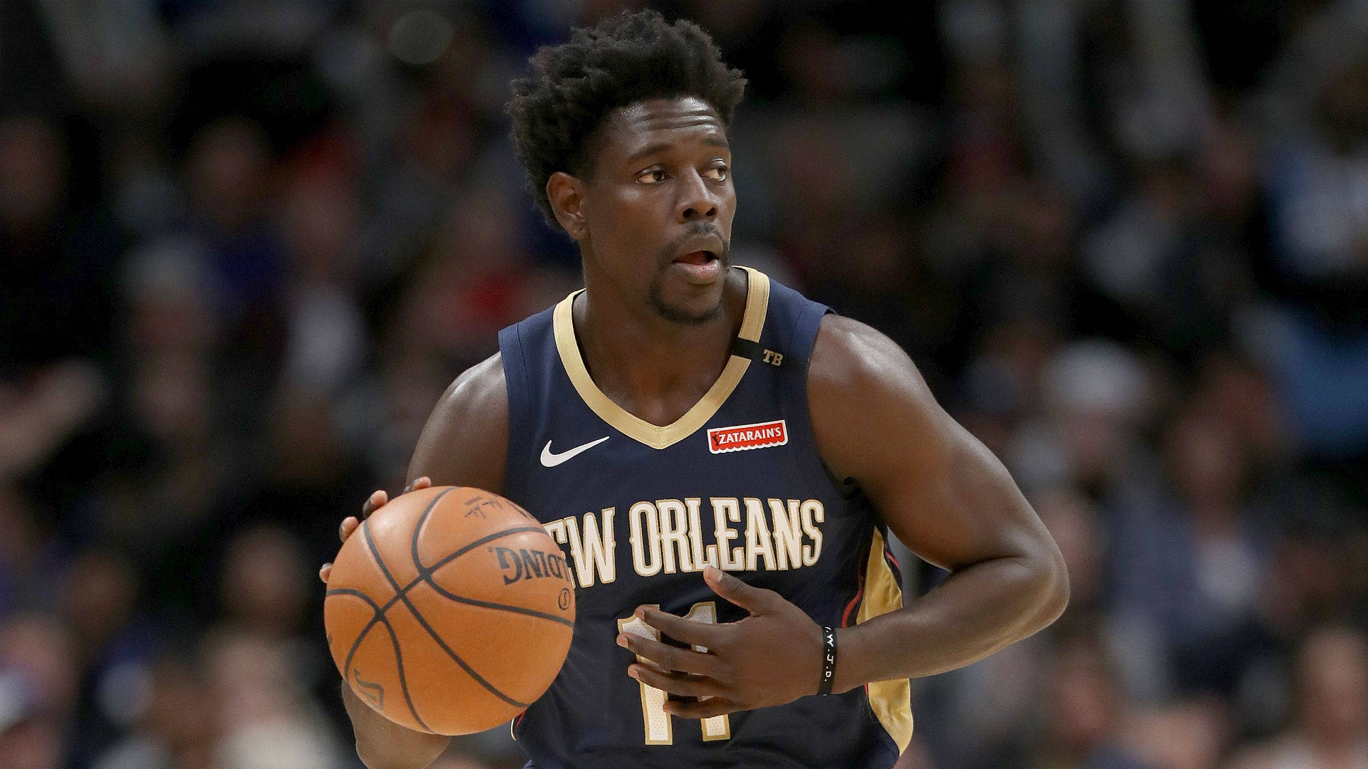 New Orleans Player Jrue Holiday Background