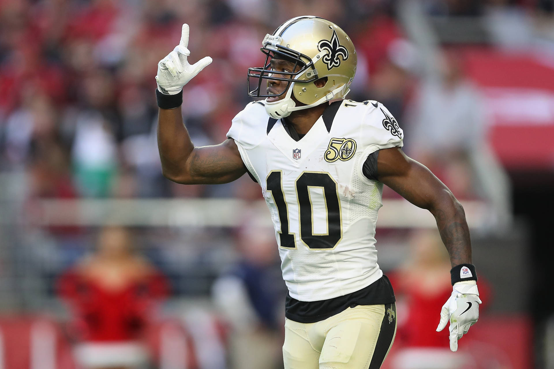 New Orleans Saints Brandin Cooks Pointing Up Background