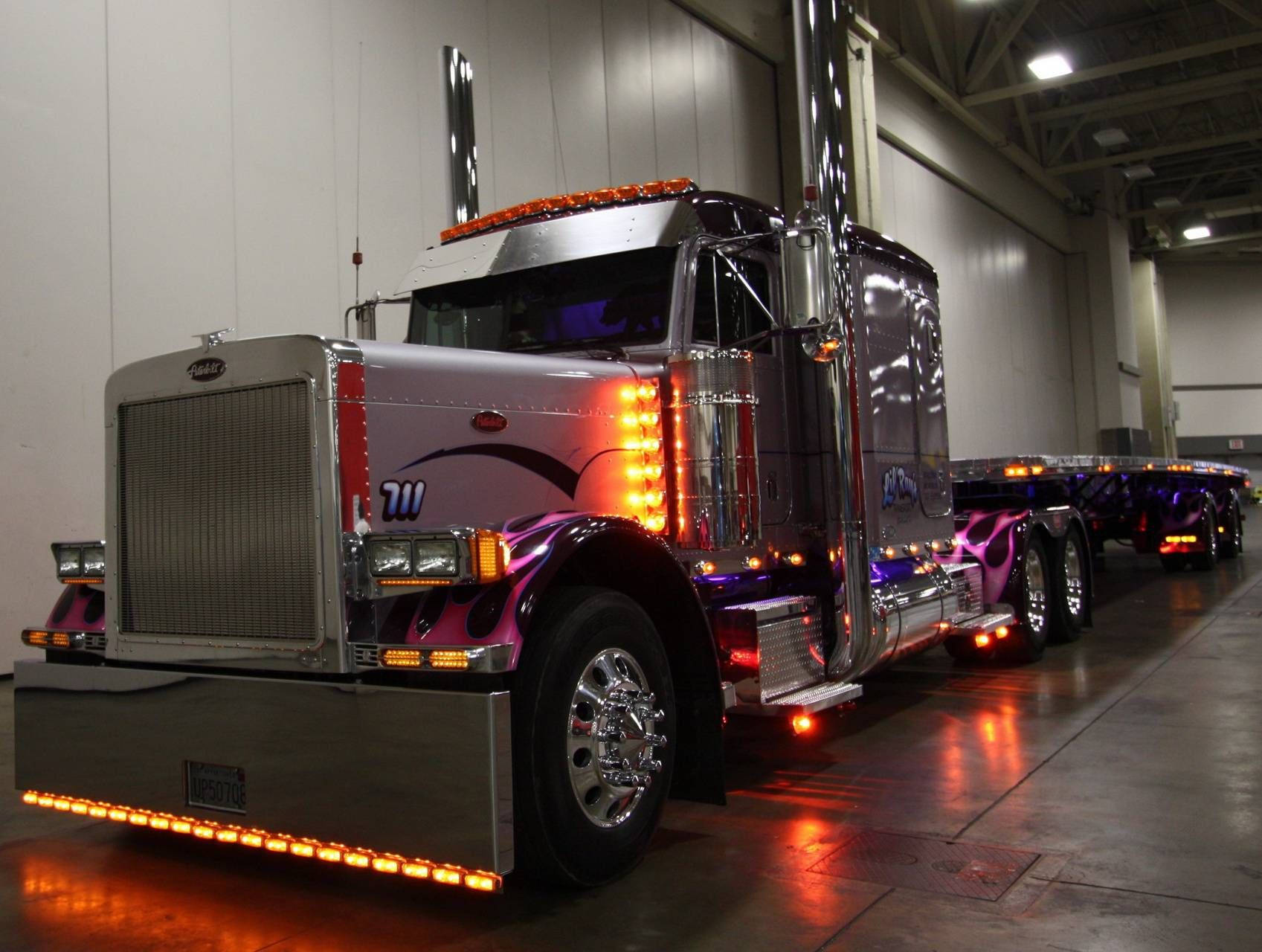 New Peterbilt Truck With Flashing Lights Background