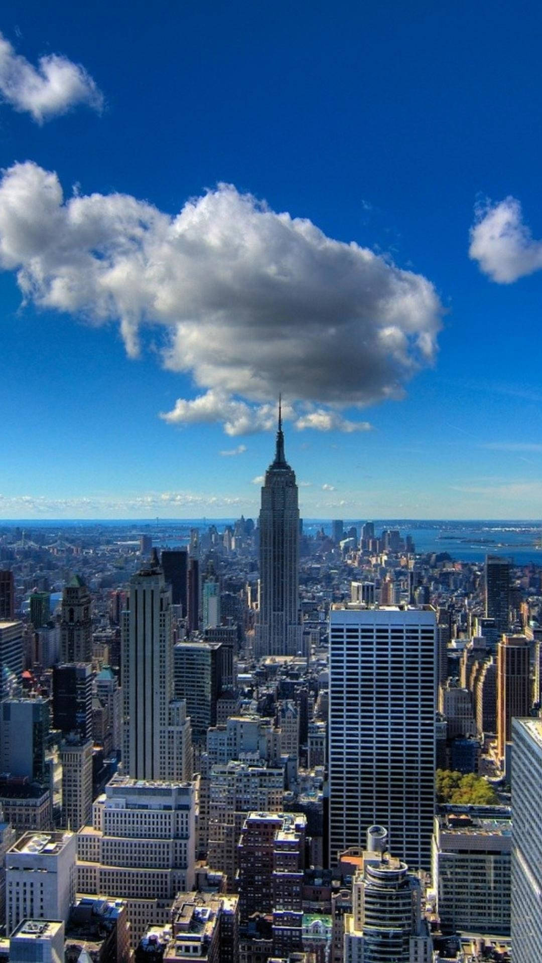 New York City Iphone X Cloud And Buildings Background