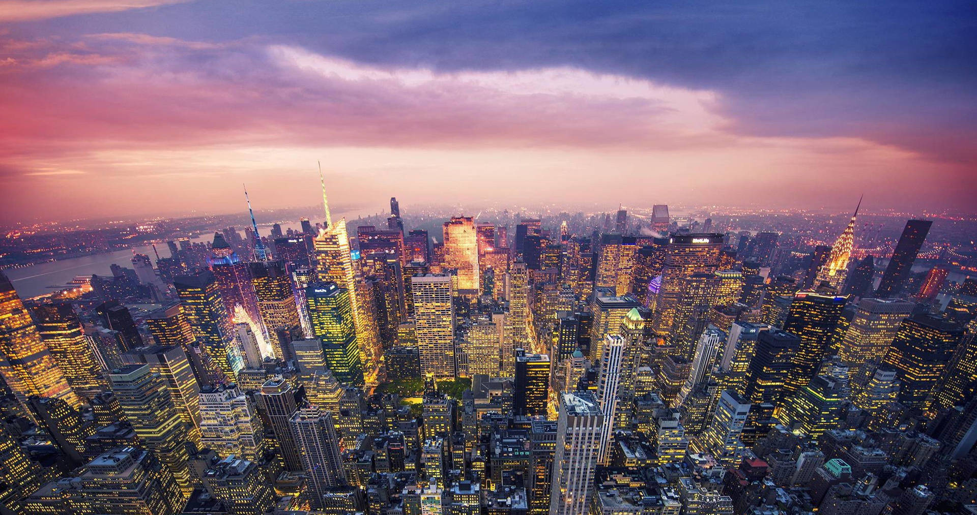 New York City Skyscrapers Reflected In A Pond Background