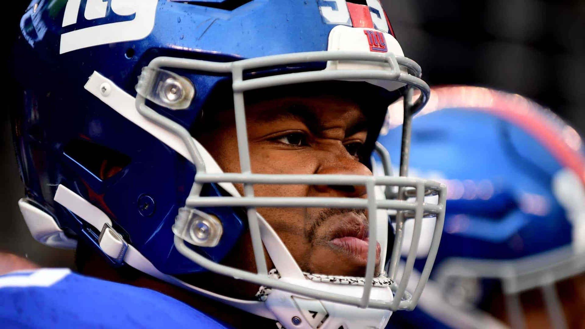 New York Giants Star Athlete Bj Hill Side Angle Shot Background