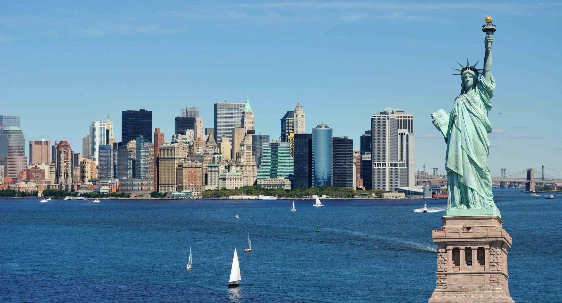 New York Hd Liberty Statue Against Buildings Background