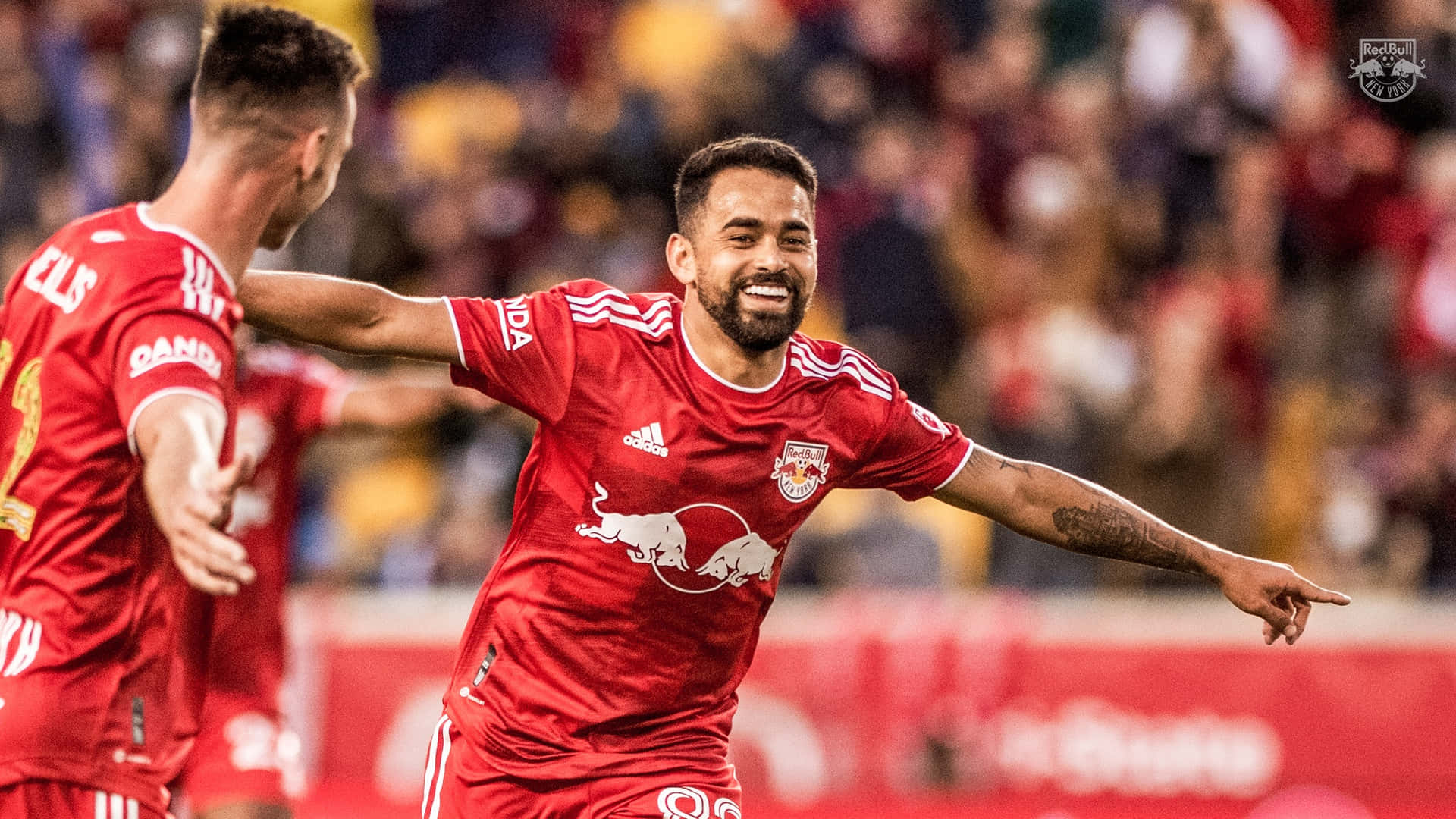 New York Red Bulls Midfielder Luquinhas Celebrating His Fifth Goal Background