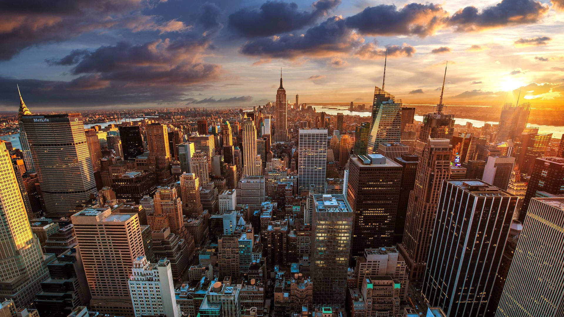 New York Skyline With Glowing Sun Background