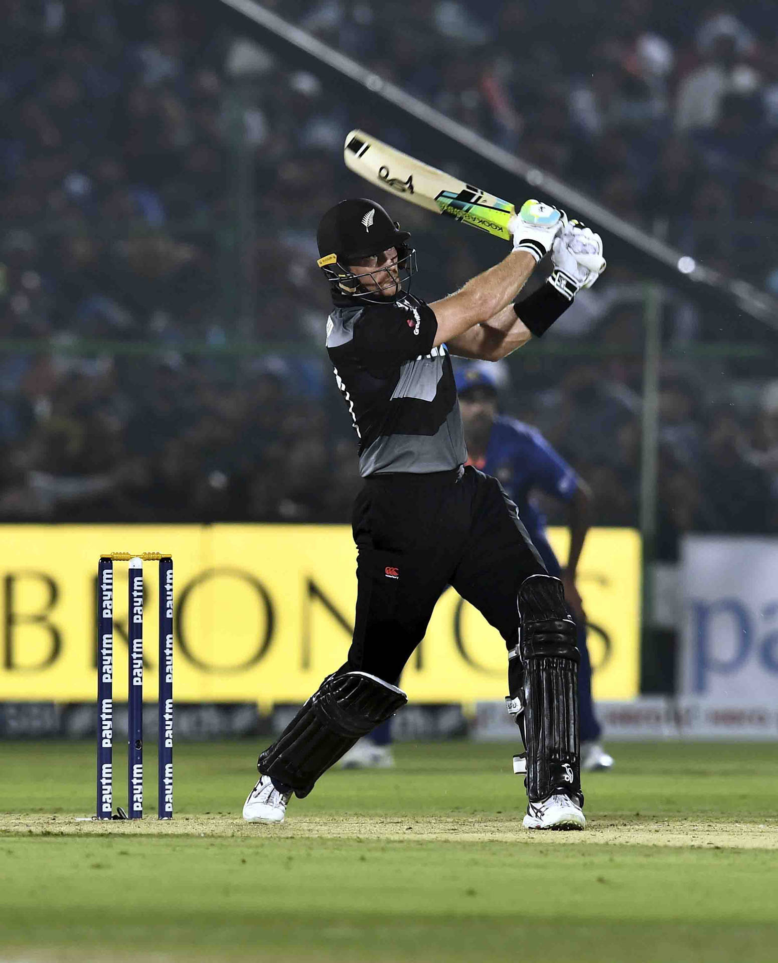 New Zealand Cricket Martin Swinging Bat Background