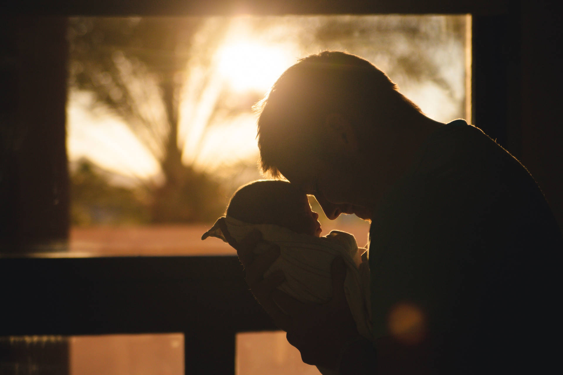 Newborn Baby Girl Father Sunset Background