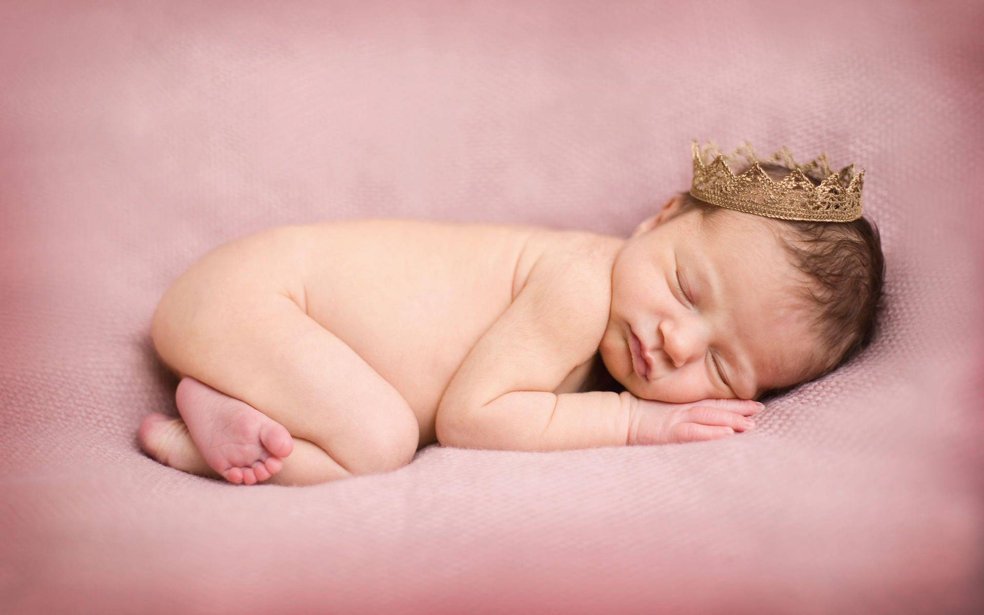 Newborn Baby Sleeping Serenely Wrapped In A Soft Blanket Background