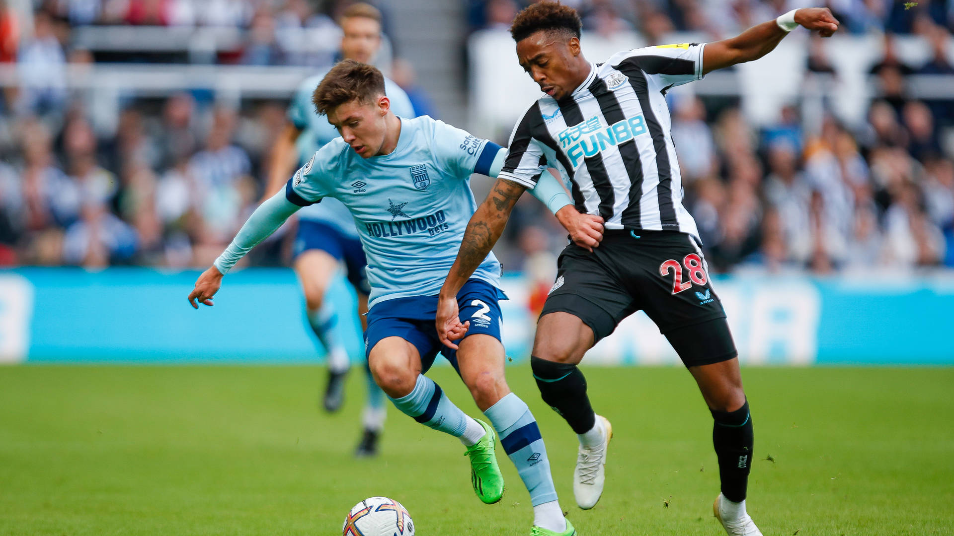 Newcastle United Fc Player Stealing Football Background