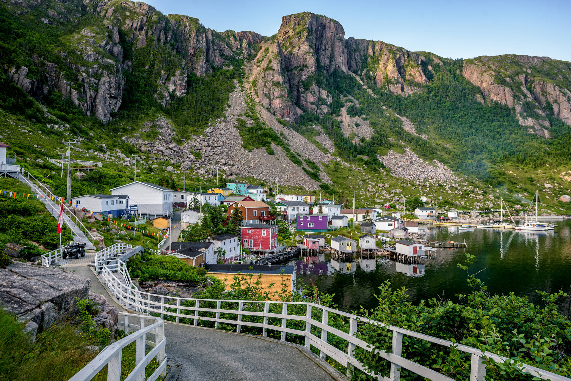 Newfoundland Town In The Mountains Background