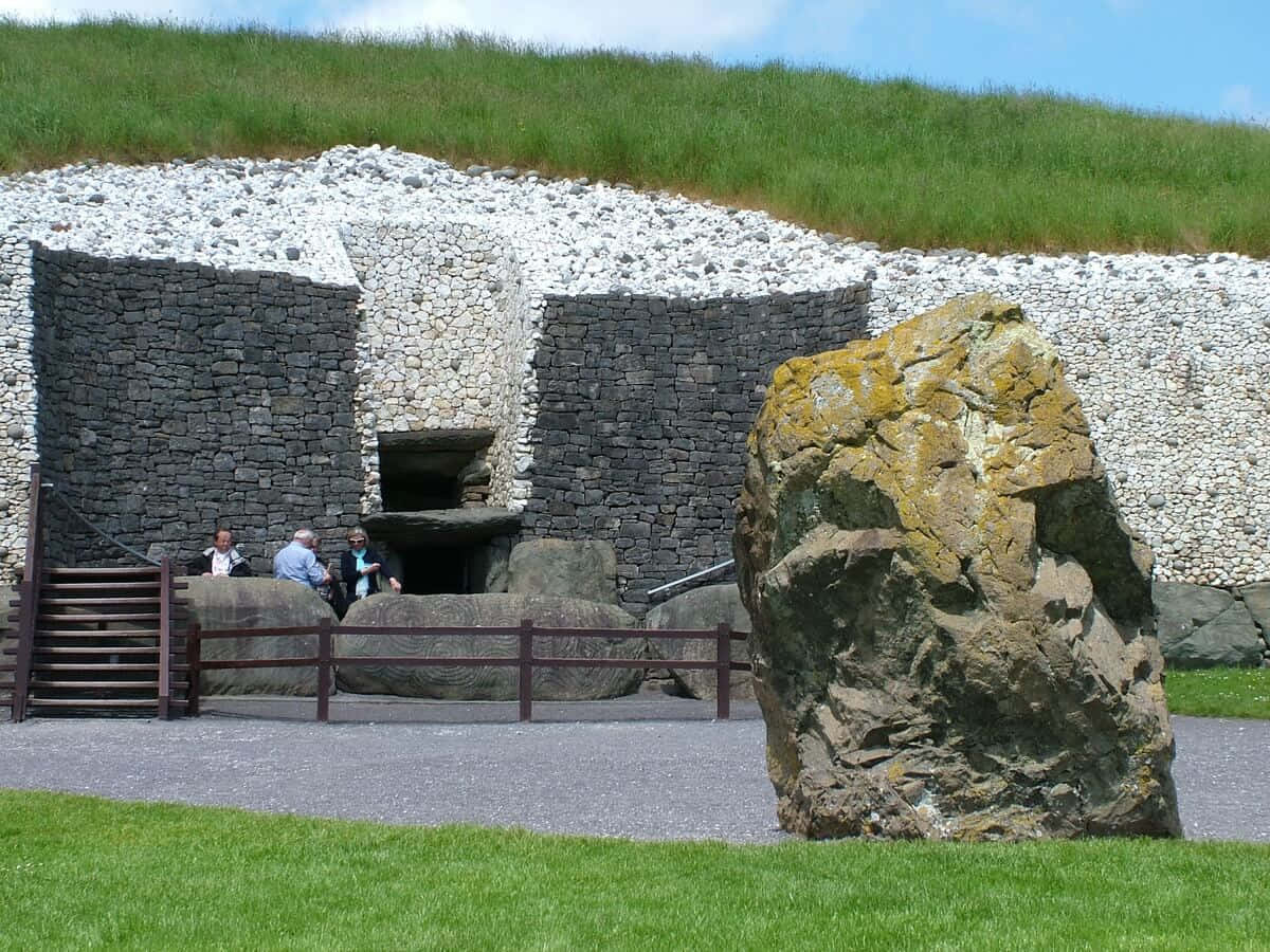 Newgrange Entrance With Large Rock Background