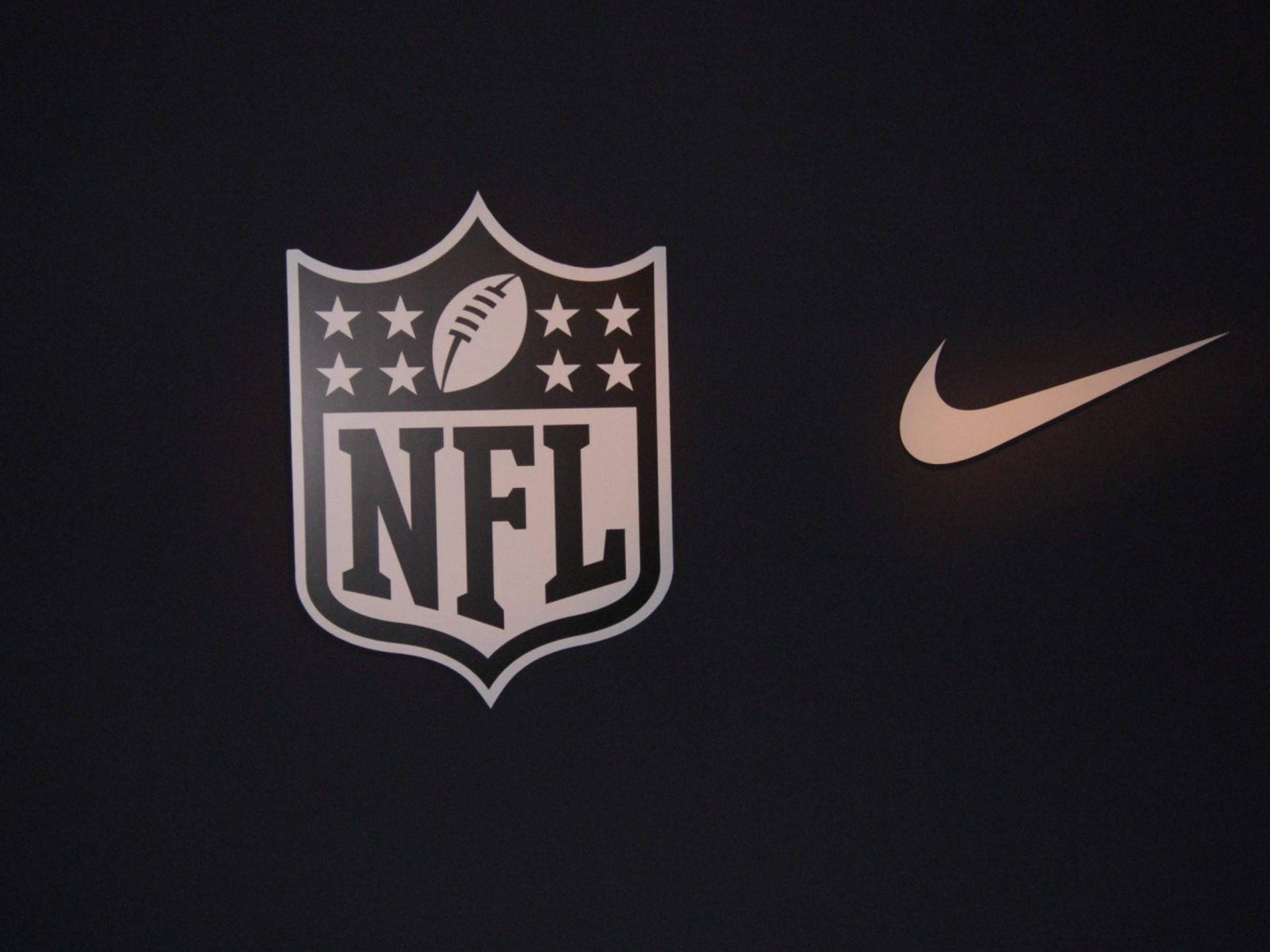 Nfl Football And Nike Logos Background