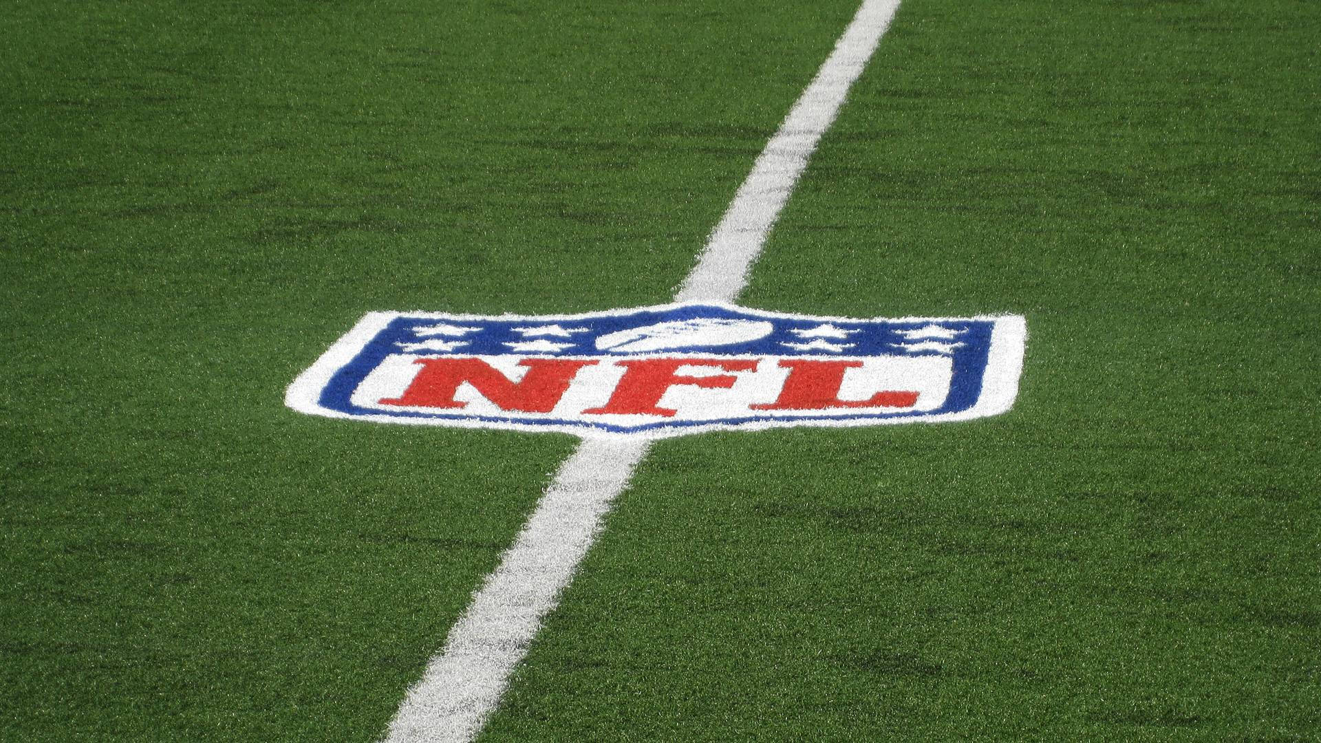 Nfl Football Logo On Field Background