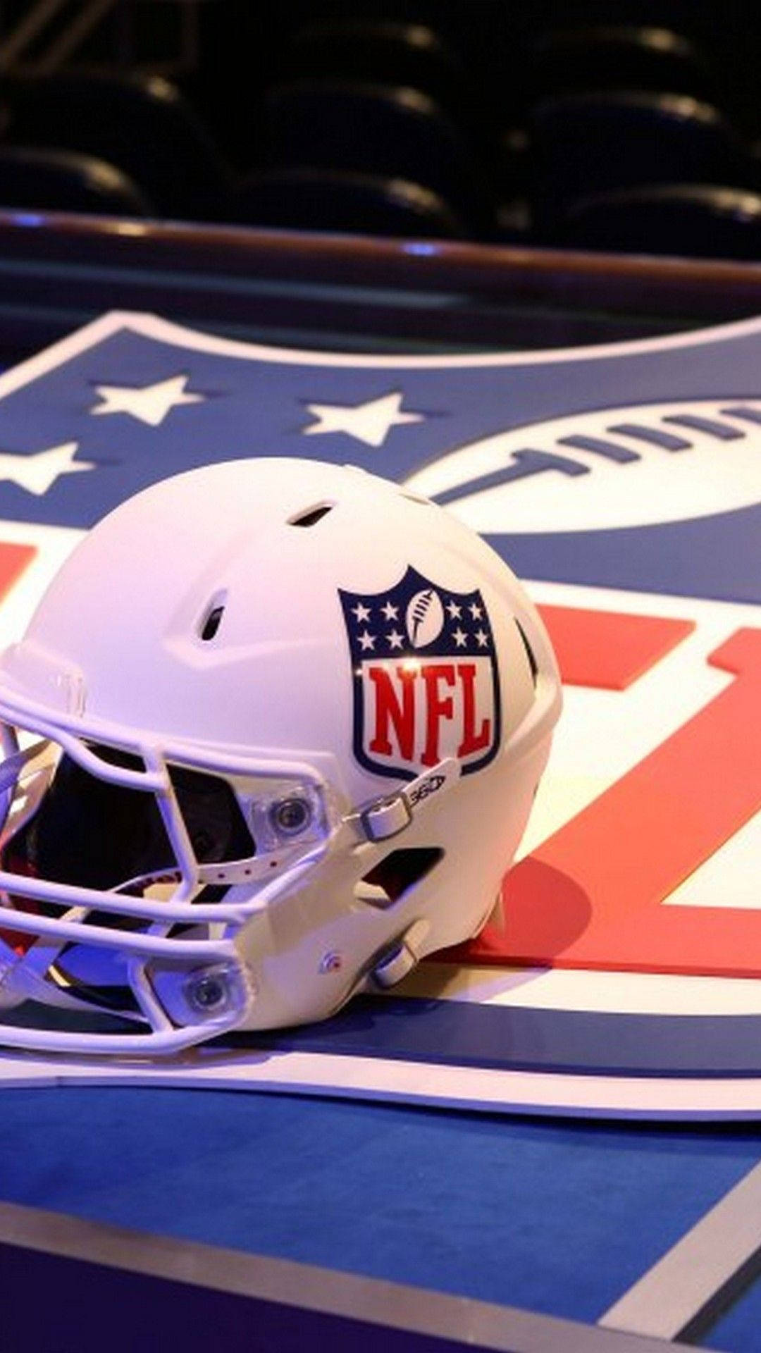 Nfl Logo On Football Helmet Background
