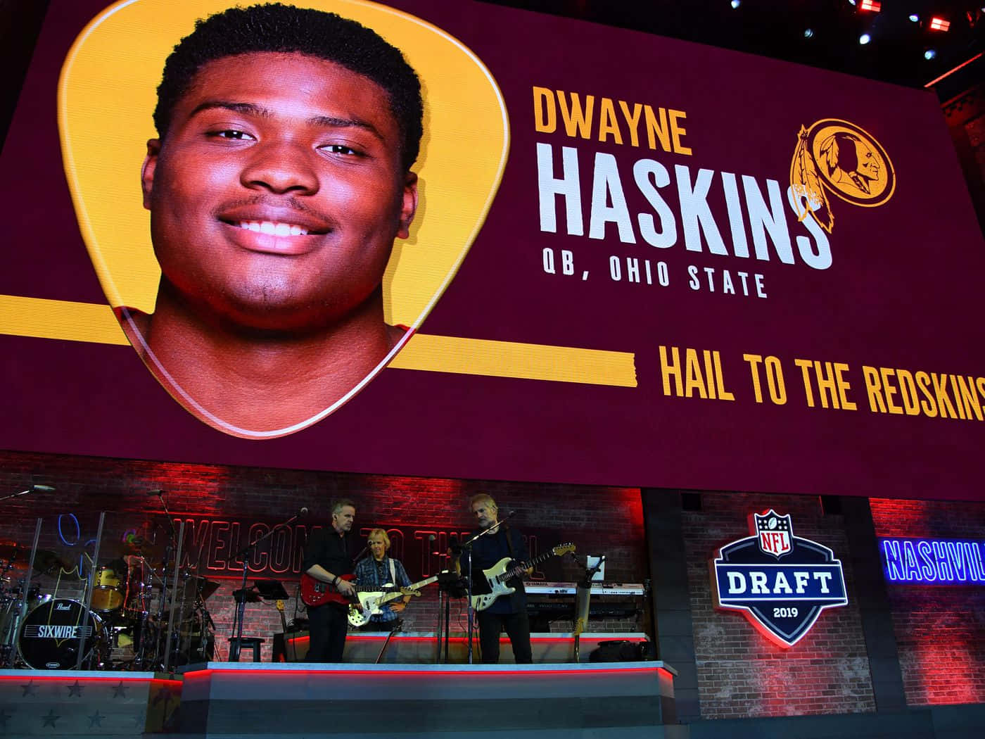 Nfl Quarterback Dwayne Haskins Takes The Field Background