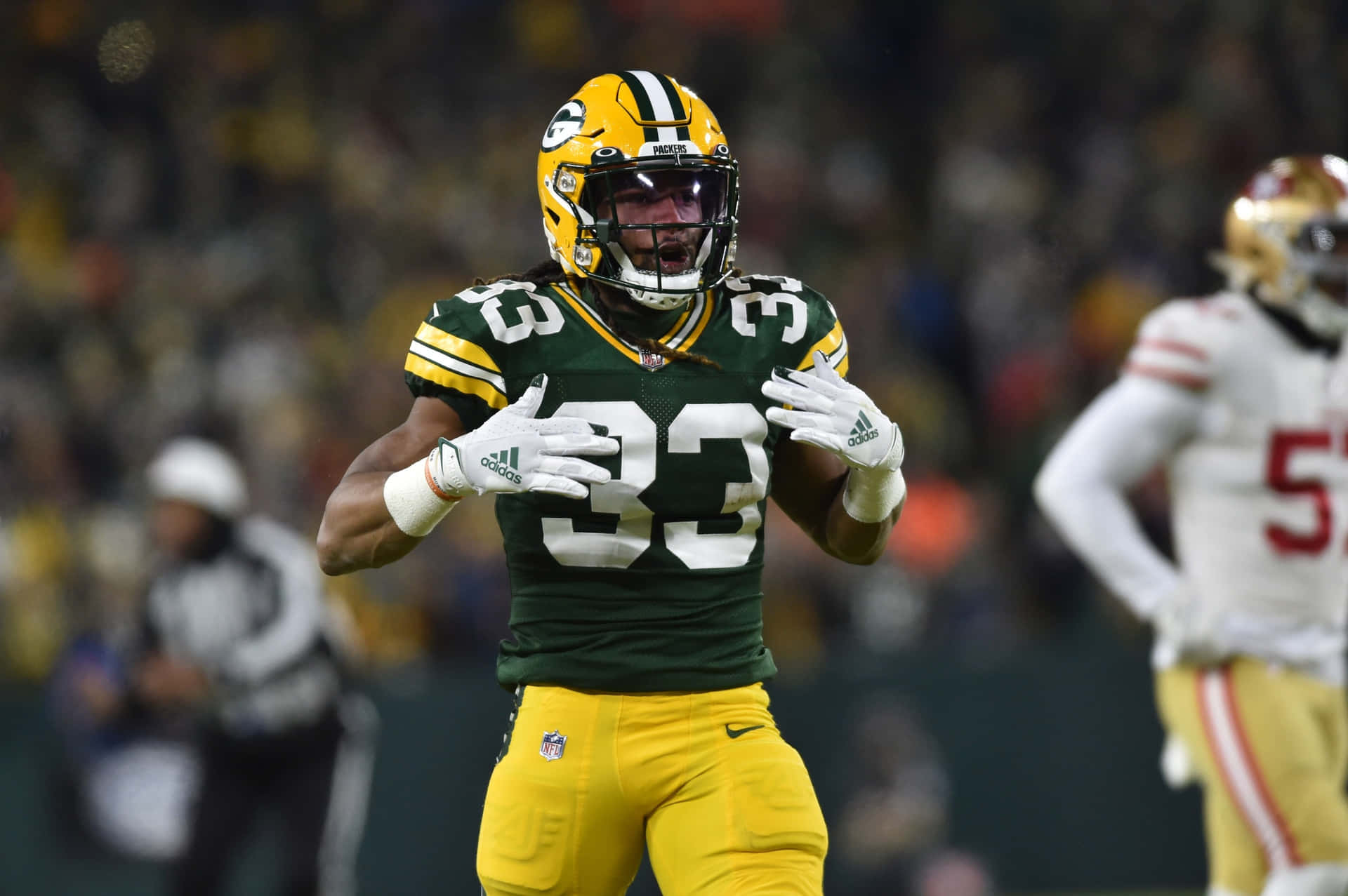 Nfl Running Back Aaron Jones Background