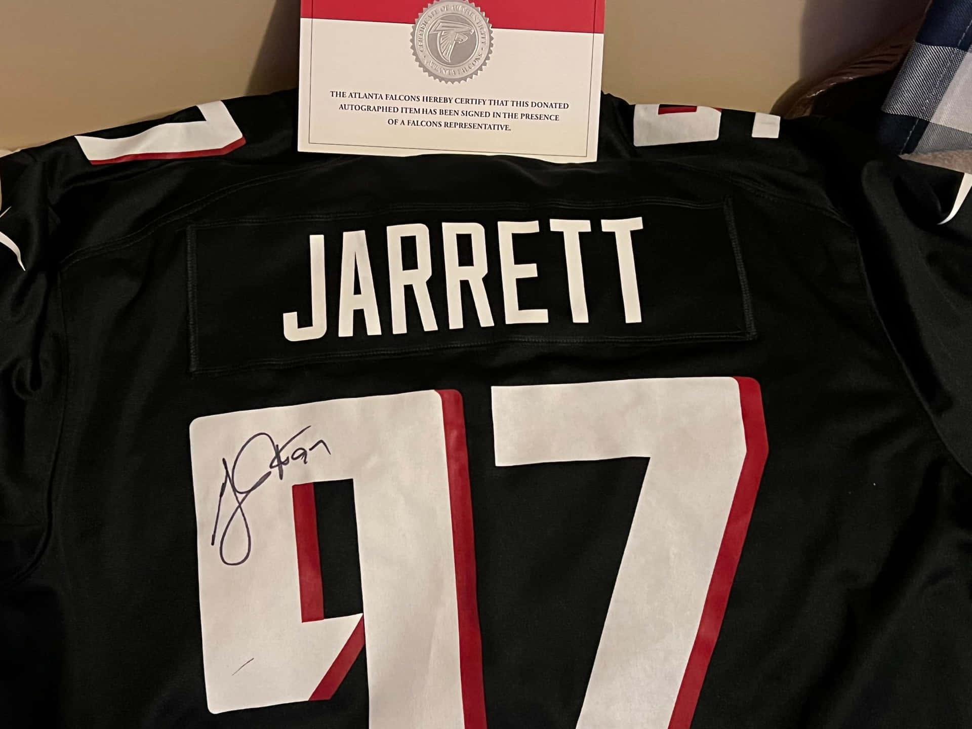 Nfl Star Grady Jarrett Autographed Jersey Background
