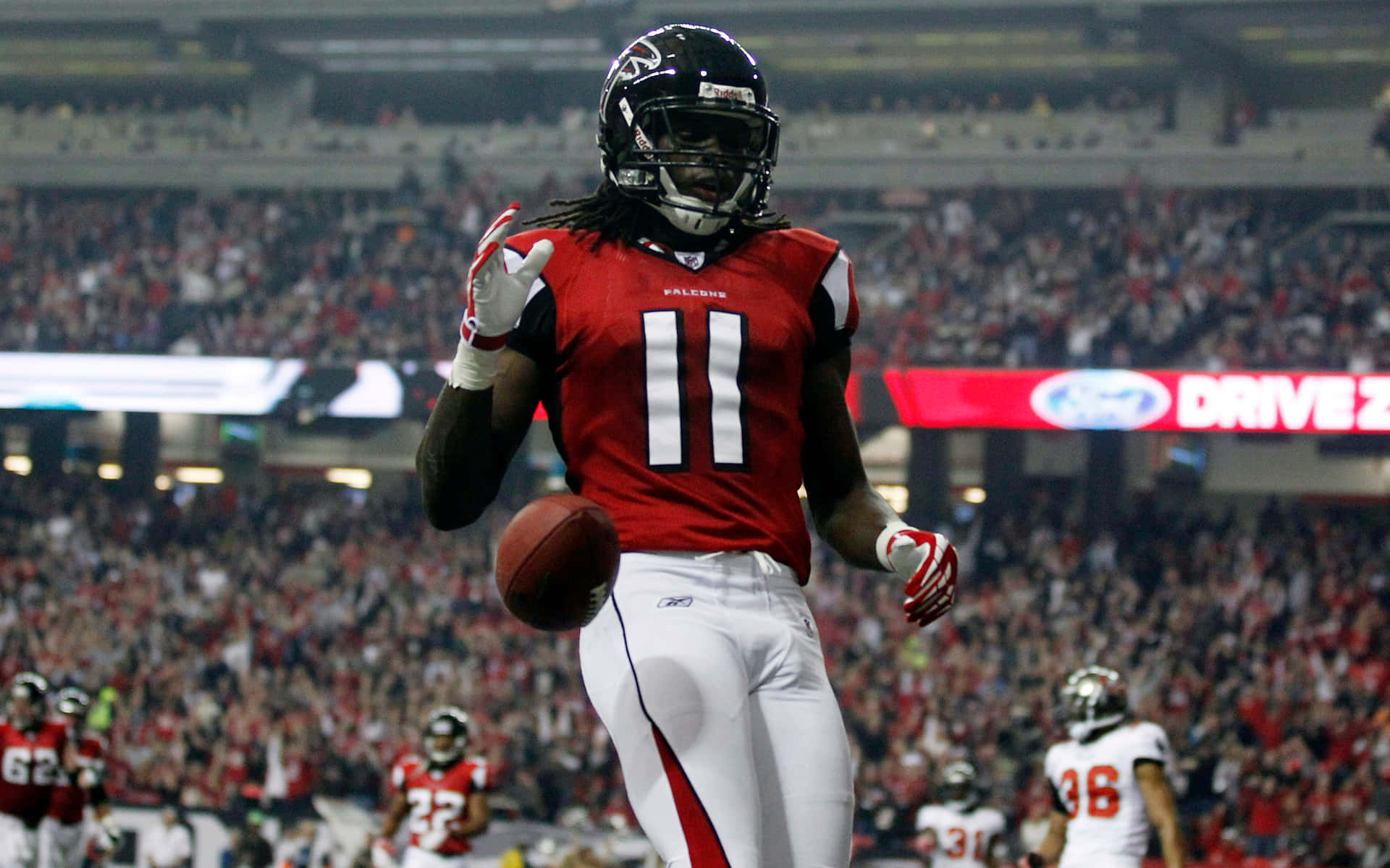 Nfl Superstar Julio Jones Making A Catch Background