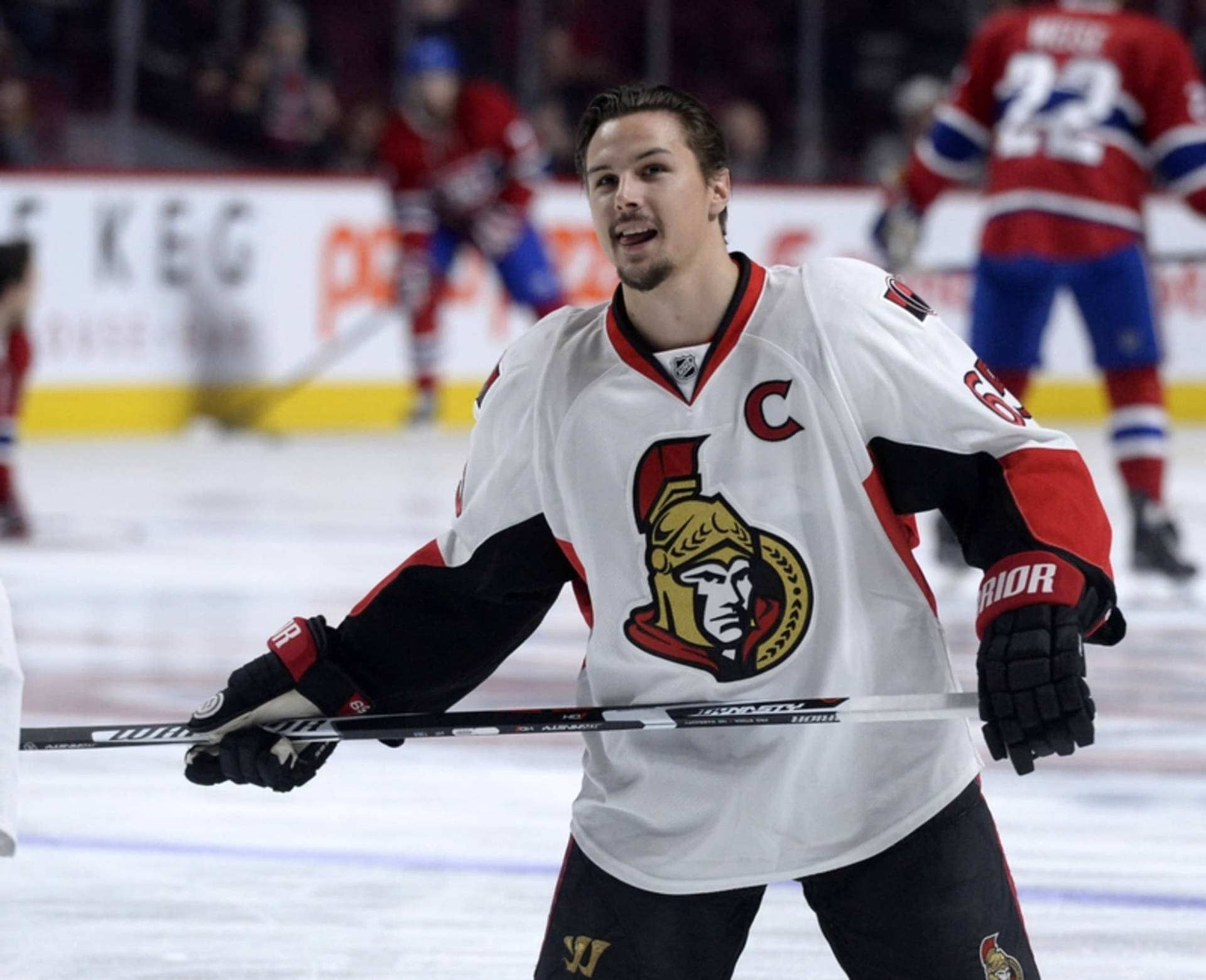 Nhl Superstar Erik Karlsson In Action Background