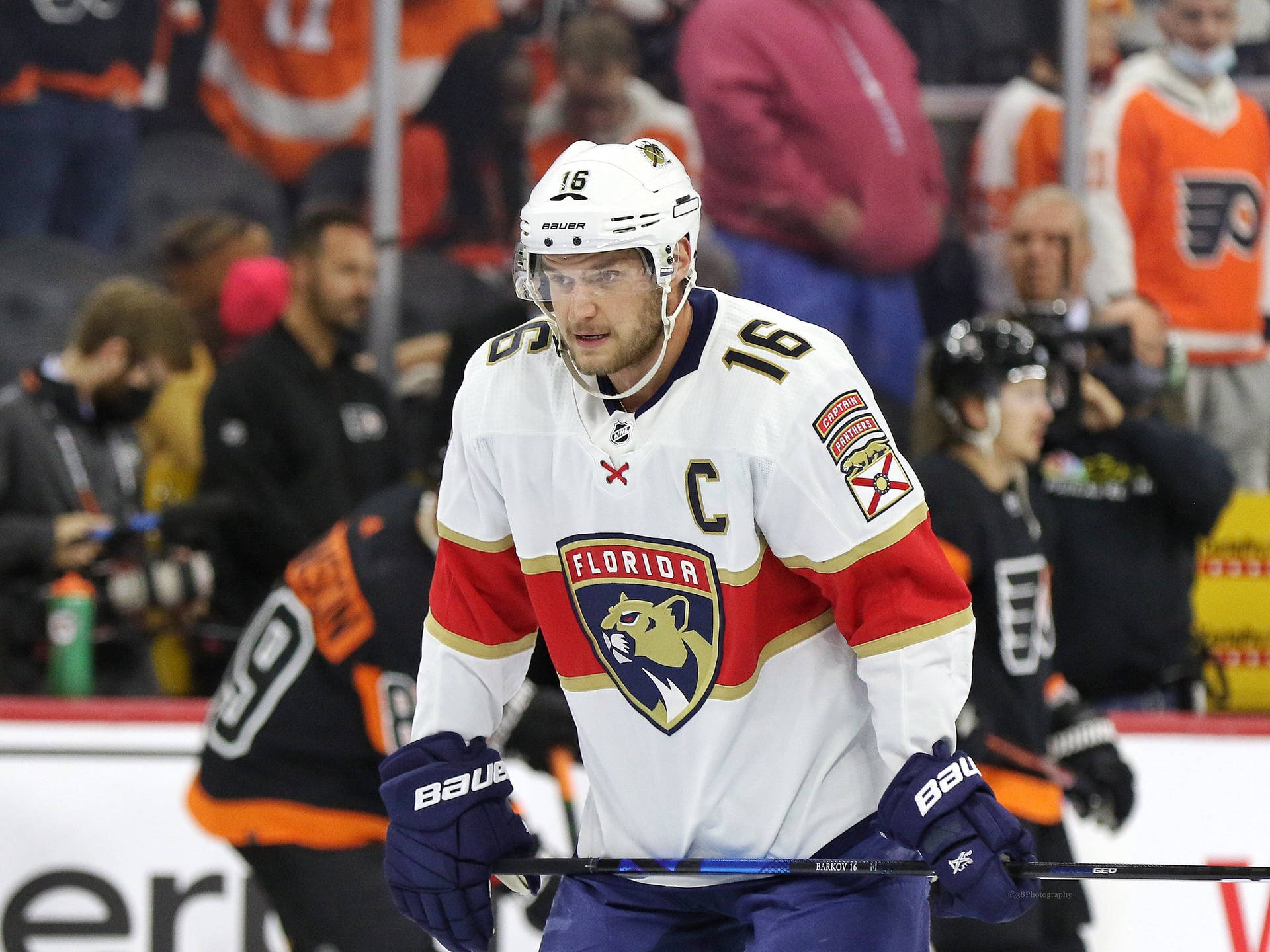 Nhl Team Captain Aleksander Barkov Against Philadelphia Flyers Background