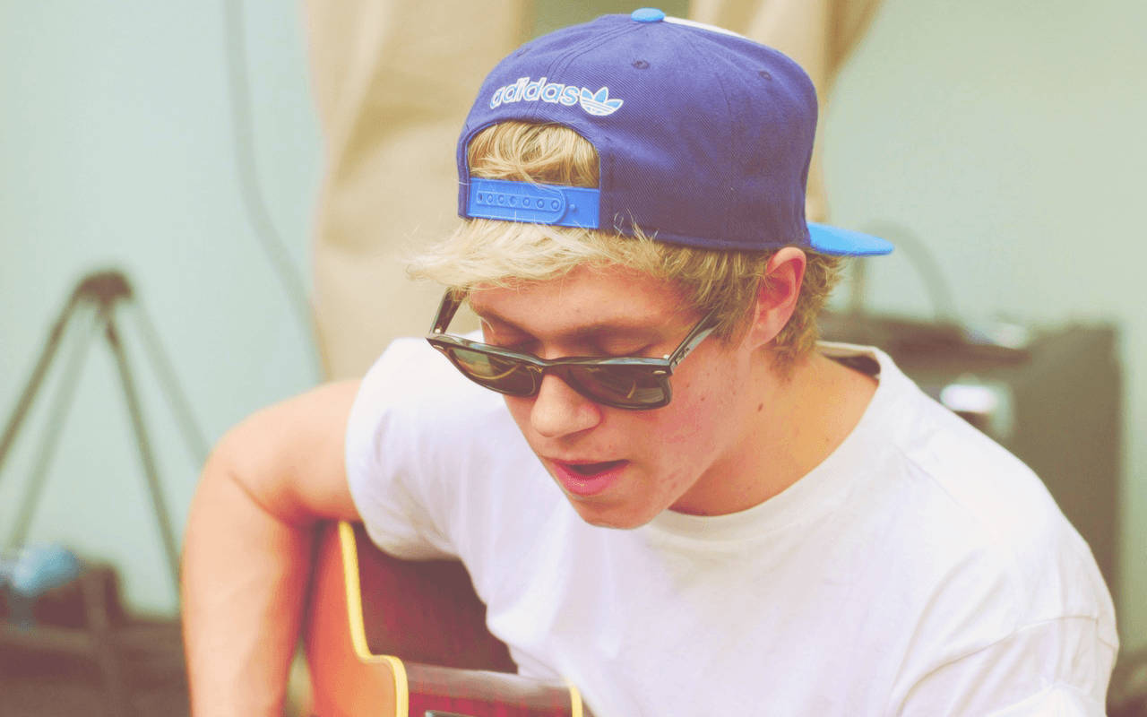 Niall Horan Cap Playing Guitar