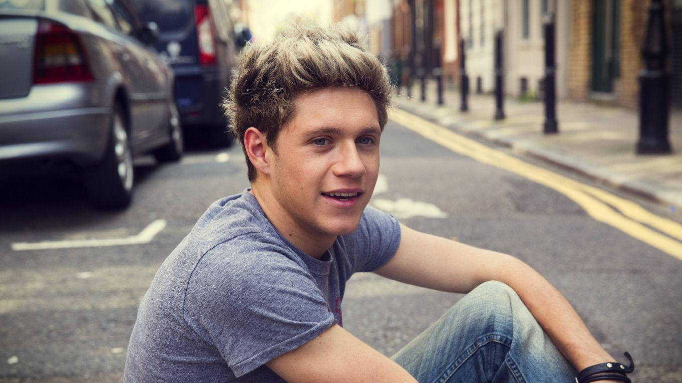 Niall Horan Sitting Road Background