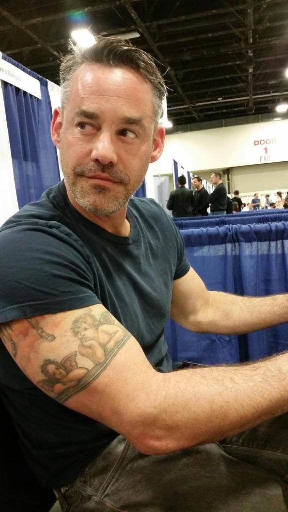 Nicholas Brendon Arm Tattoo Background