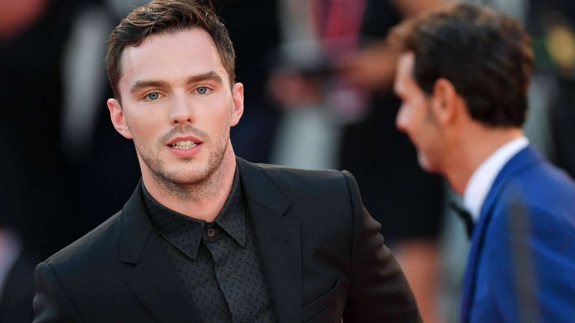 Nicholas Hoult Black Outfit Background