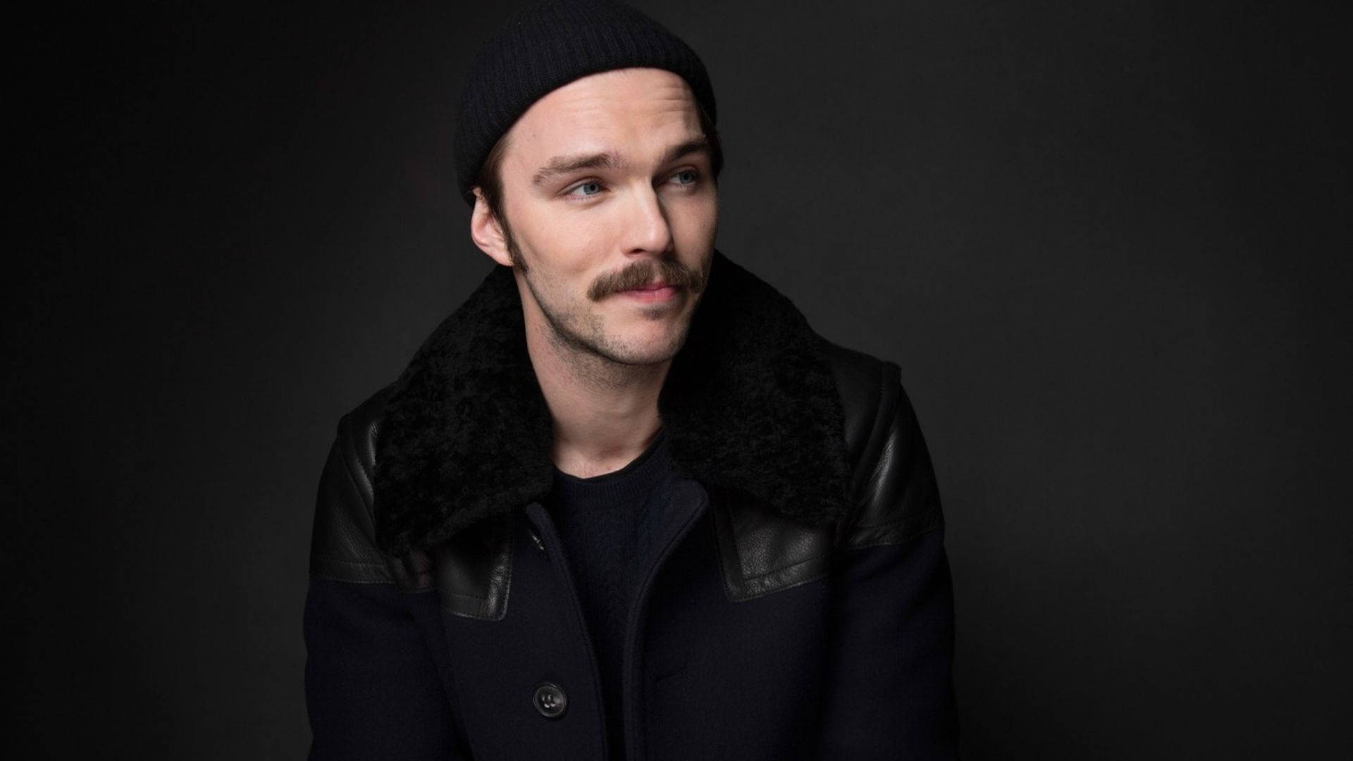 Nicholas Hoult Wearing Bonnet Background