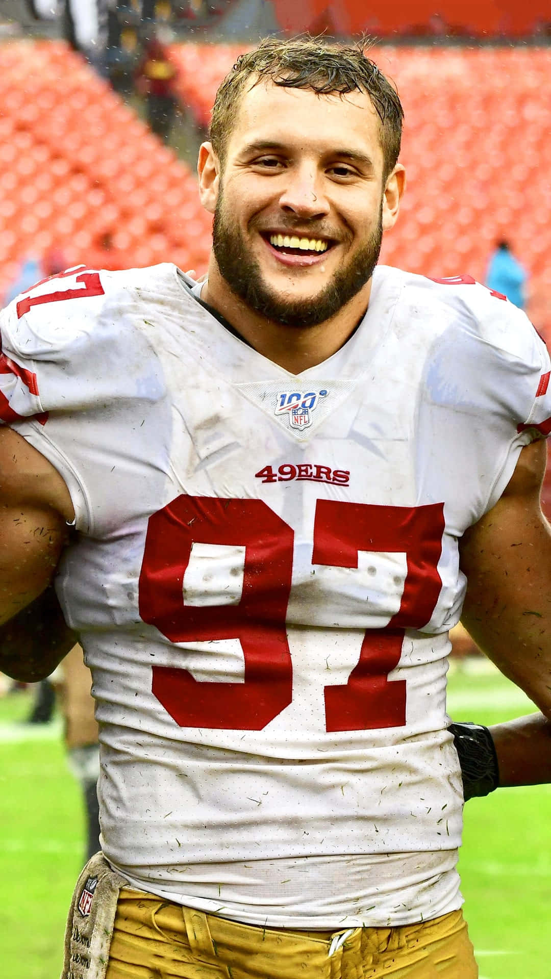 Nick Bosa Making A Game-changing Tackle In The 2019 Nfl Season Background