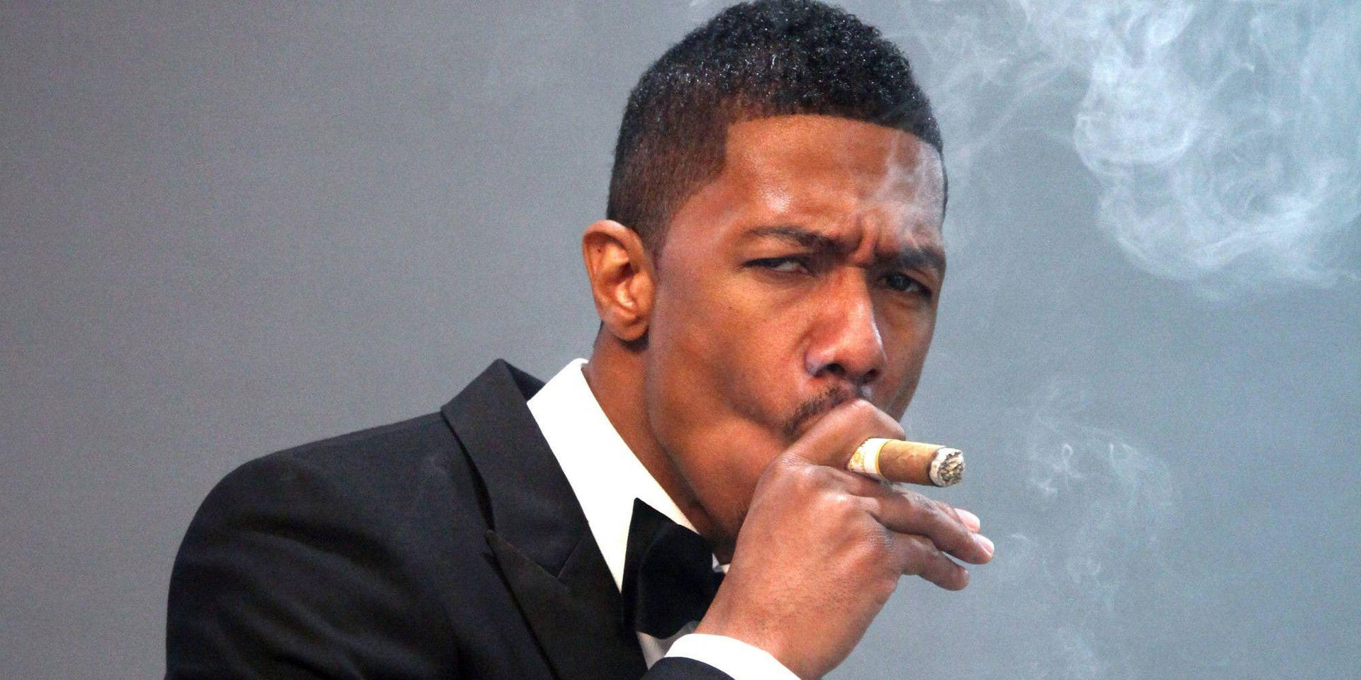 Nick Cannon With Cigar Background