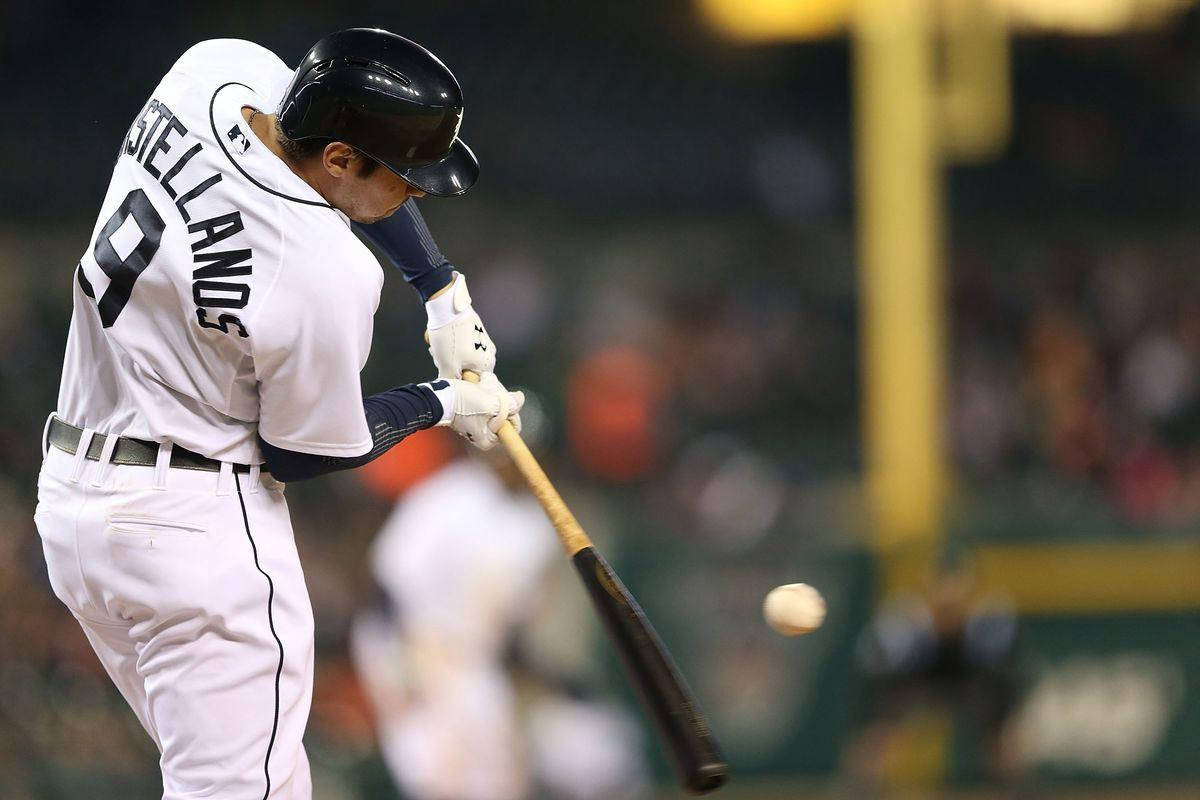 Nick Castellanos Hits Ball With Bat Background