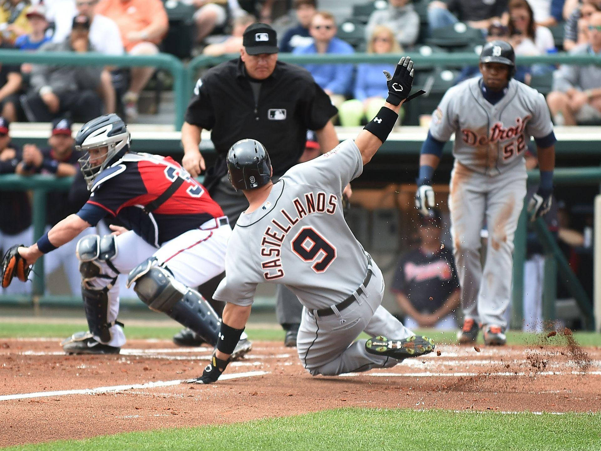 Nick Castellanos Slides Towards The Base