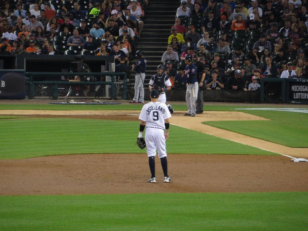 Nick Castellanos Standing In The Field Background