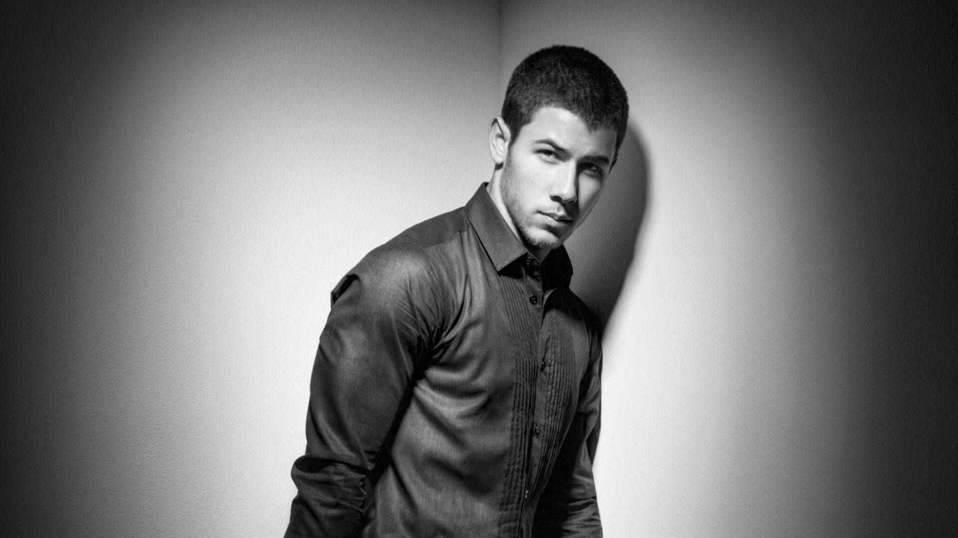 Nick Jonas In The Spotlight Background
