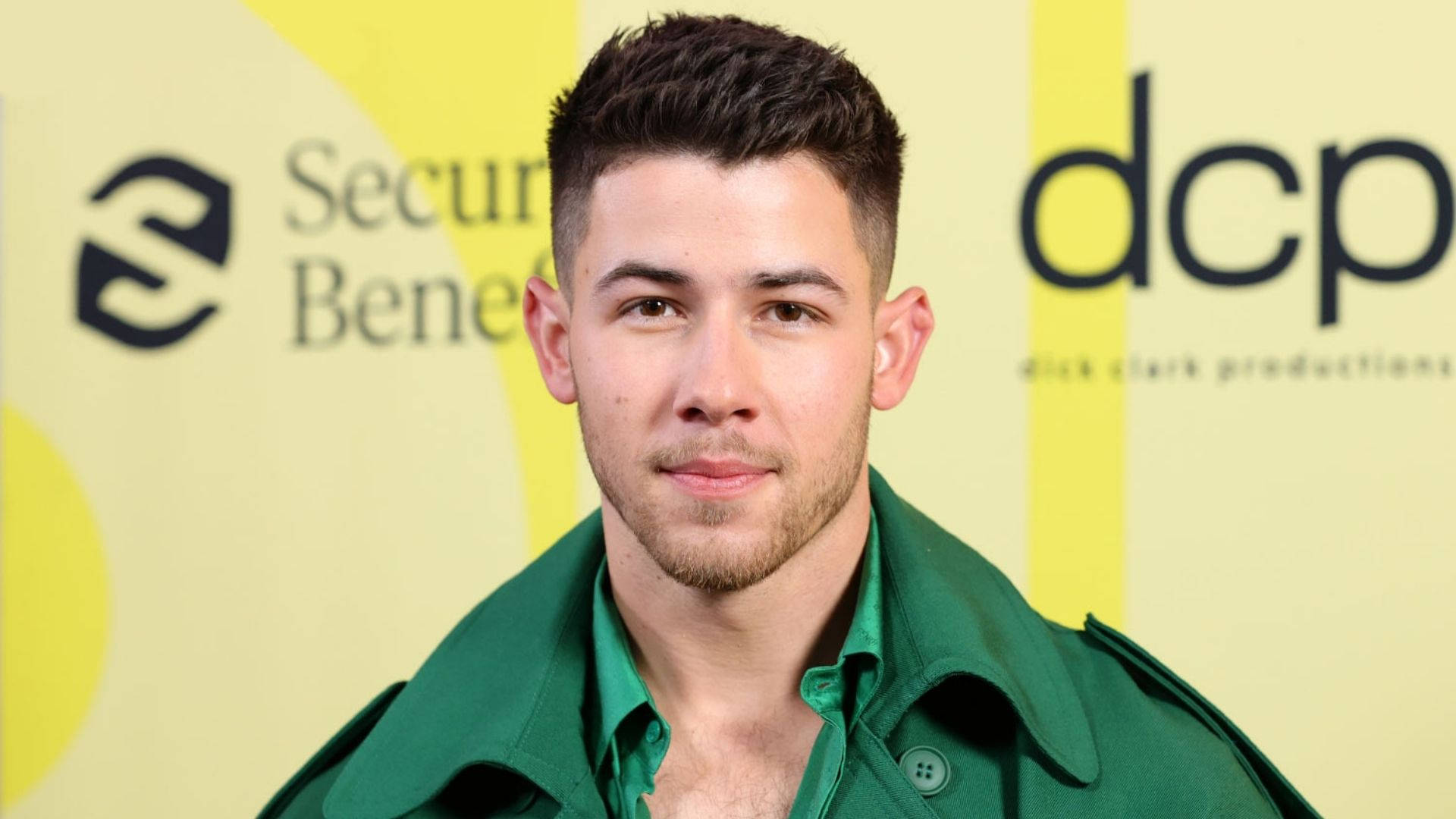 Nick Jonas On Red Carpet Background