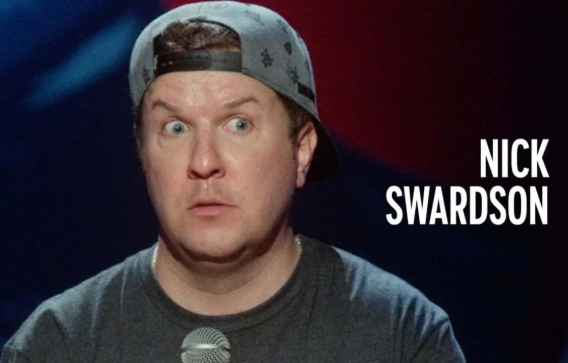 Nick Swardson Hilariously Spreads Laughter On The Stage Background