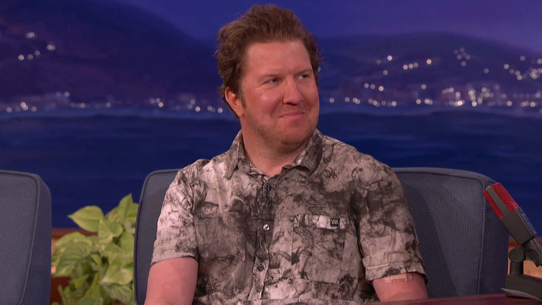 Nick Swardson Smiling For The Camera. Background