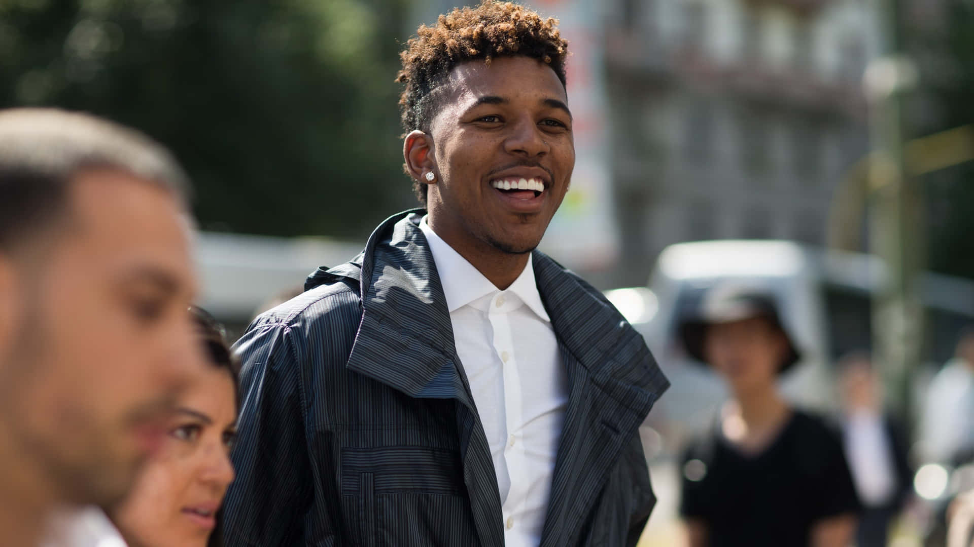 Nick Young In Suit Background