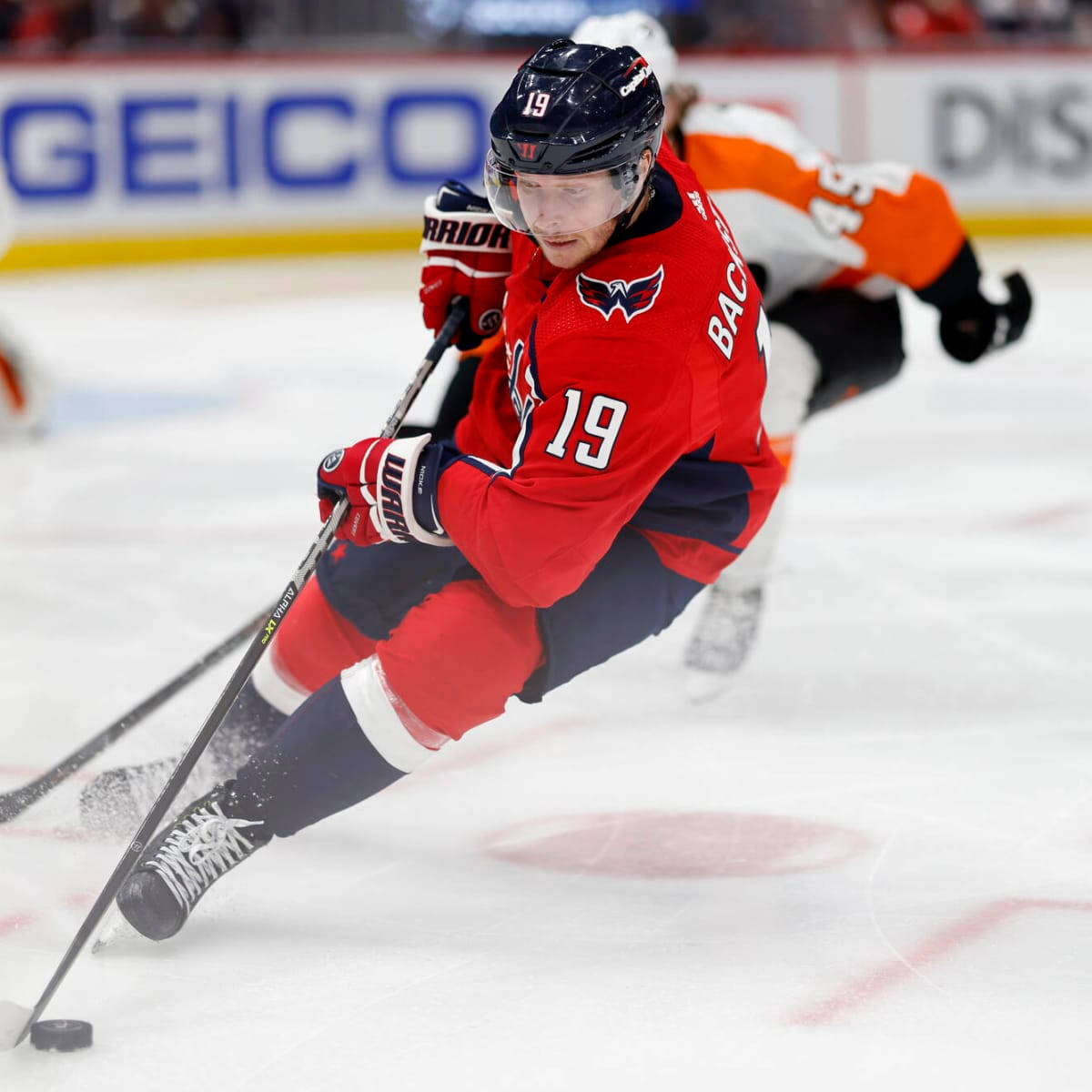 Nicklas Backstrom In Action Against Philadelphia Flyers Background