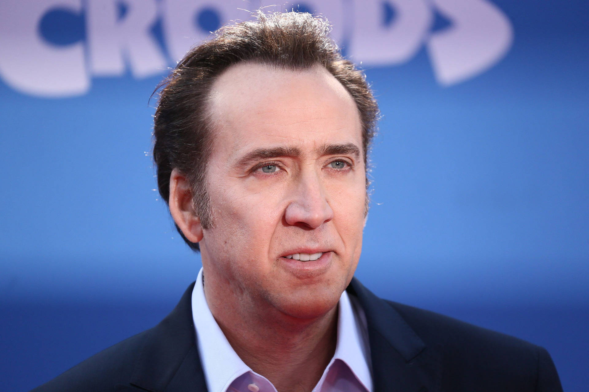 Nicolas Cage Blue Background Background