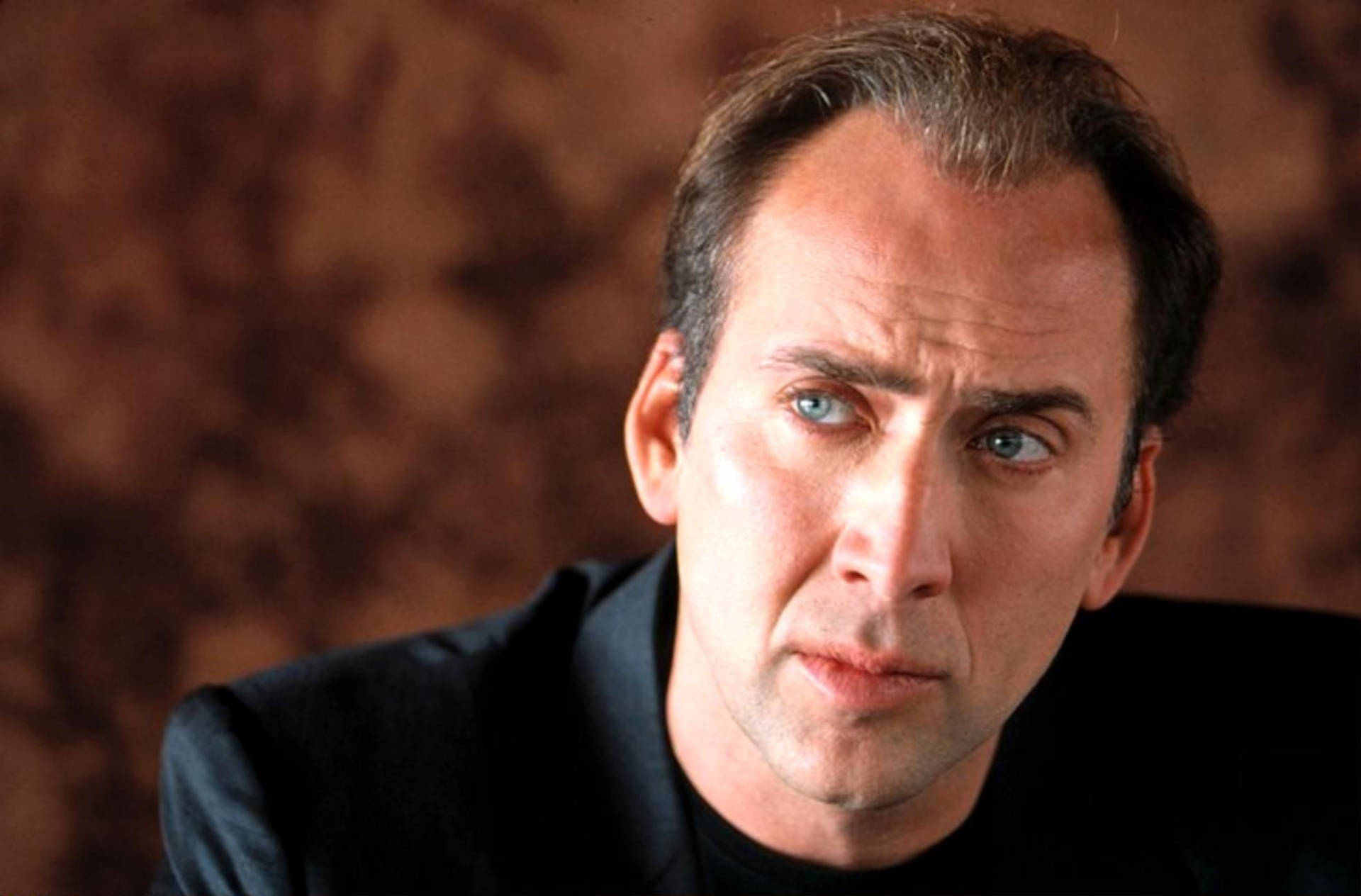 Nicolas Cage Brown Background Background