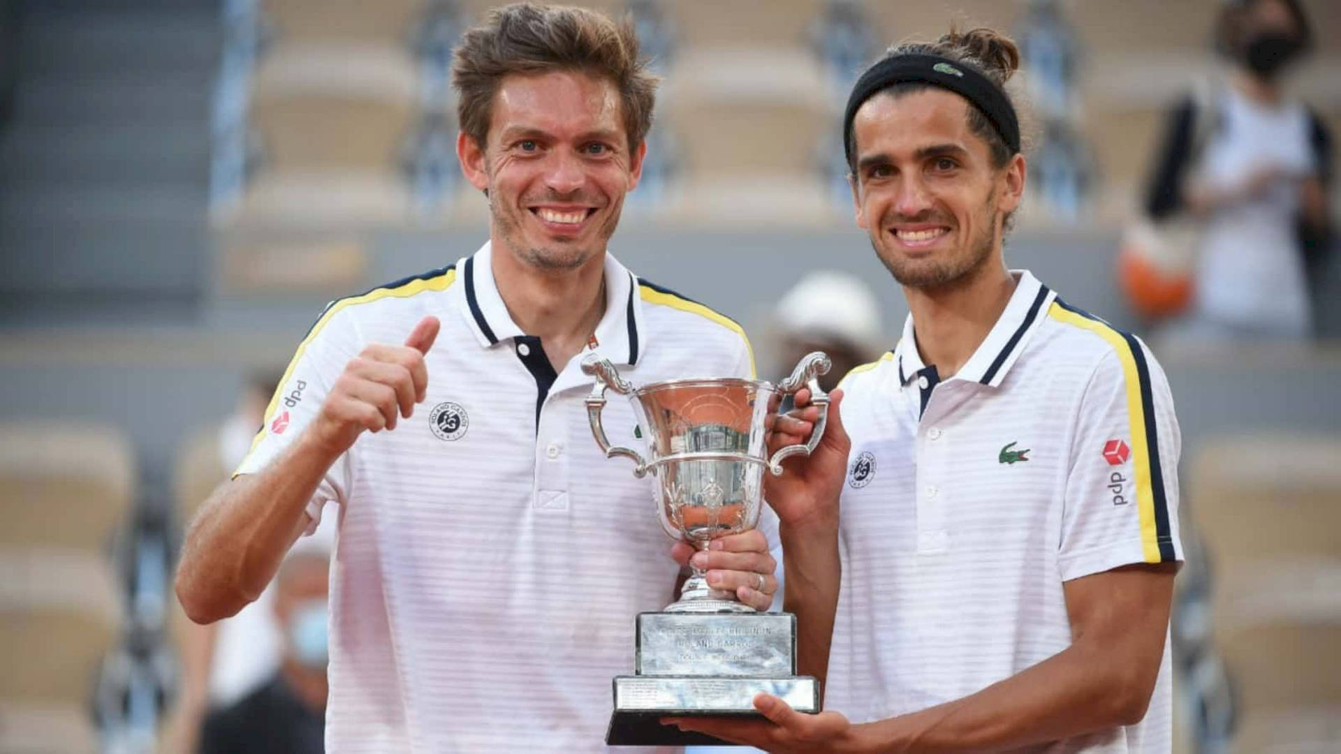 Nicolas Mahut And Herbert Smiling Background