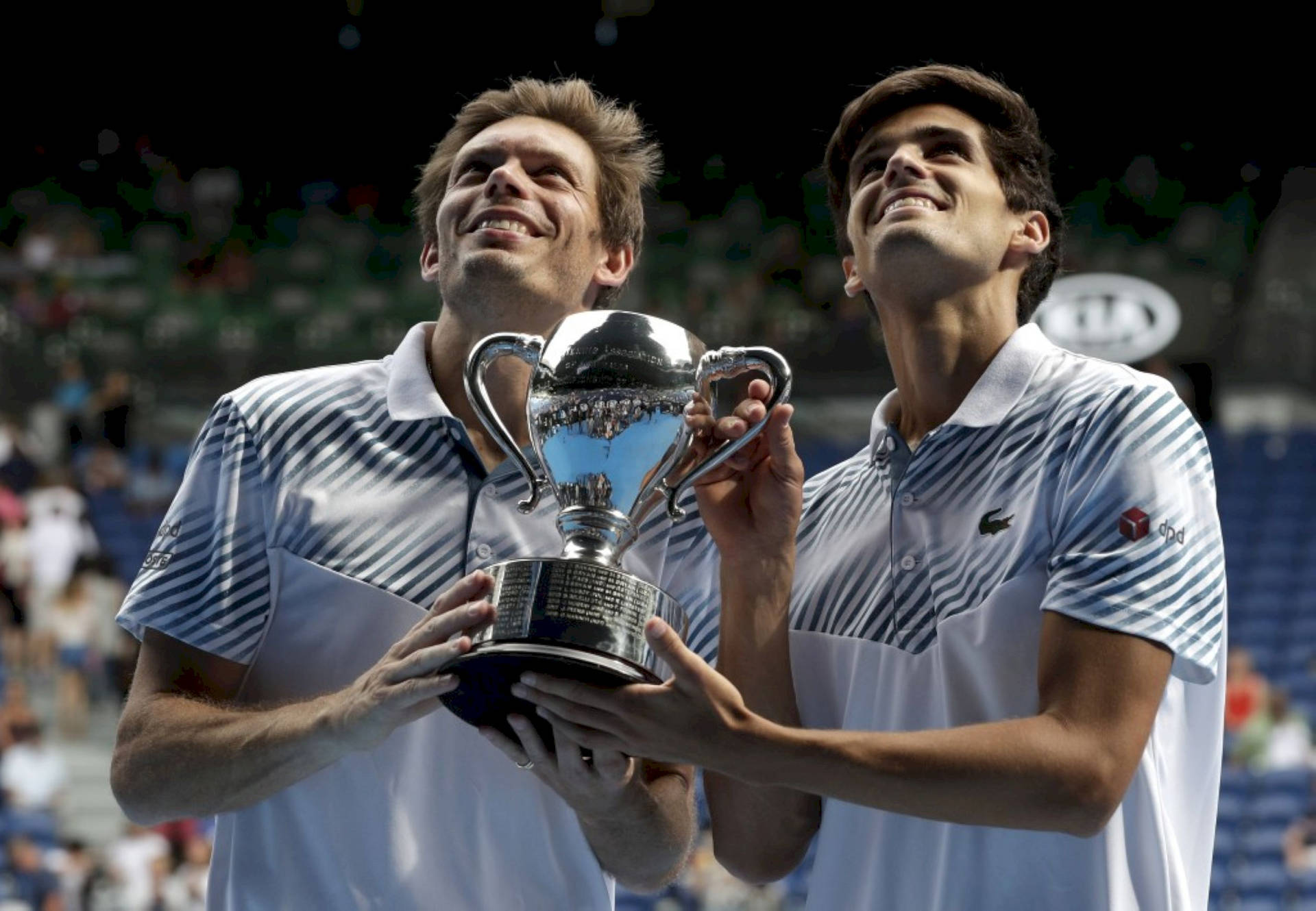 Nicolas Mahut And Partner Looking Up