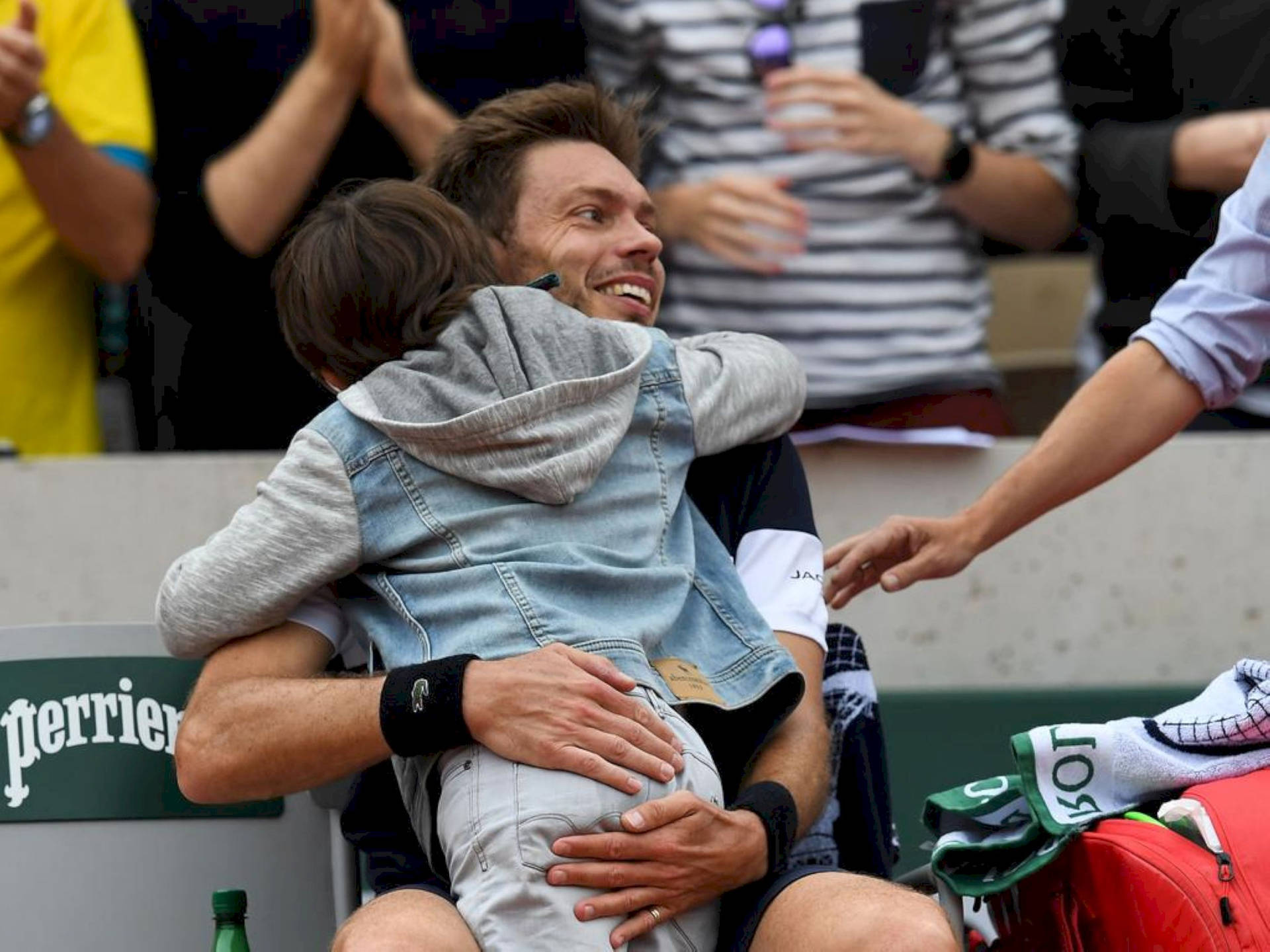 Nicolas Mahut Hugging His Child