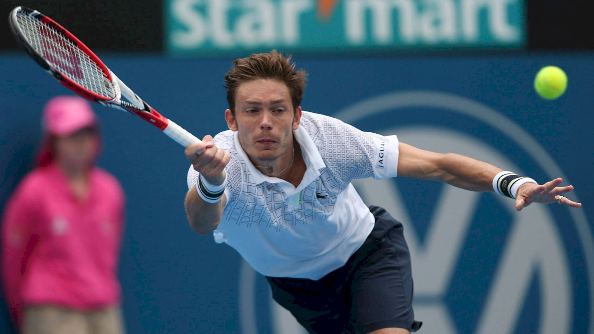 Nicolas Mahut Running After The Ball Background